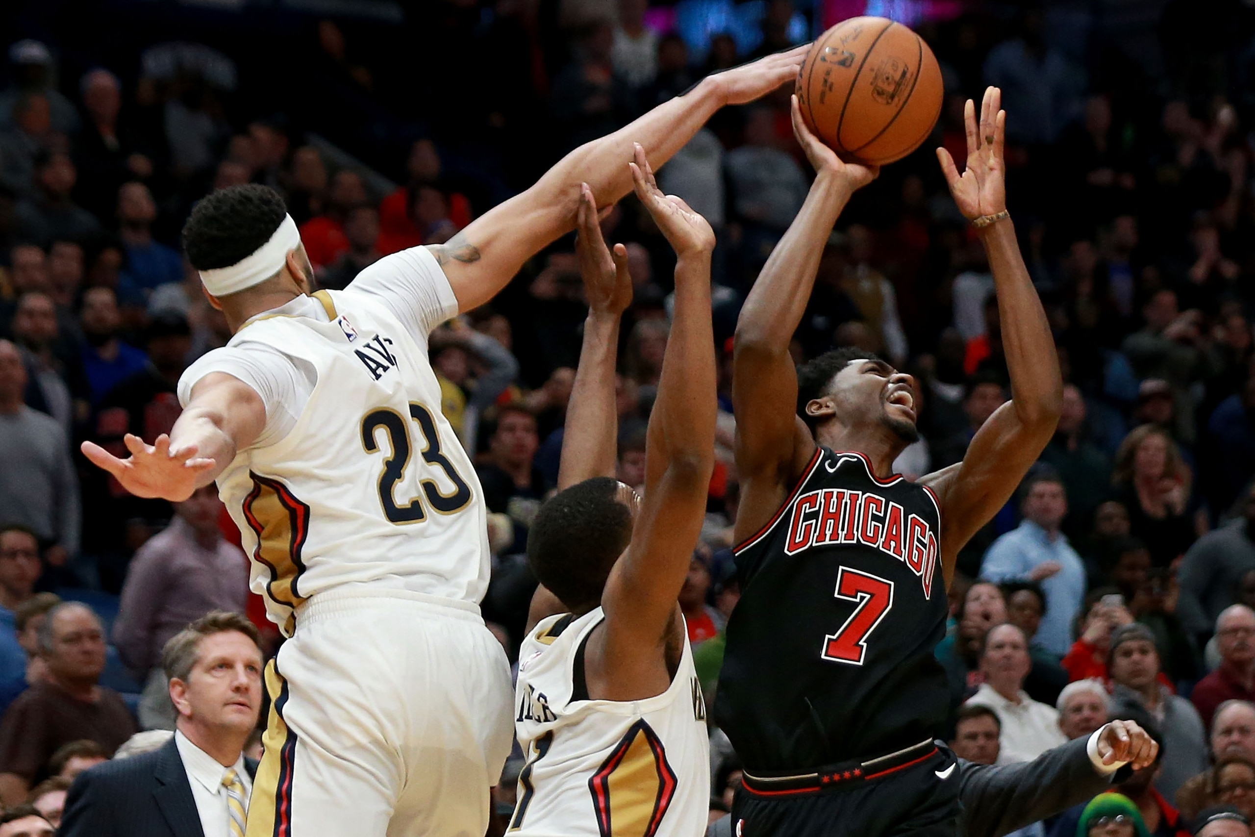 NEW ORLEANS, LA - JANUARY 22: Justin Holiday #7 of the Chicago Bulls is fouled by Anthony Davis #23 of the New Orleans Pelicans during a NBA game at the Smoothie King Center on January 22, 2018 in New Orleans, Louisiana. NOTE TO USER: User expressly ackn NEW ORLEANS, LA - JANUARY 22: Justin Holiday #7 of the Chicago Bulls is fouled by Anthony Davis #23 of the New Orleans Pelicans during a NBA game at the Smoothie King Center on January 22, 2018 in New Orleans, Louisiana. NOTE TO USER: User expressly ackn