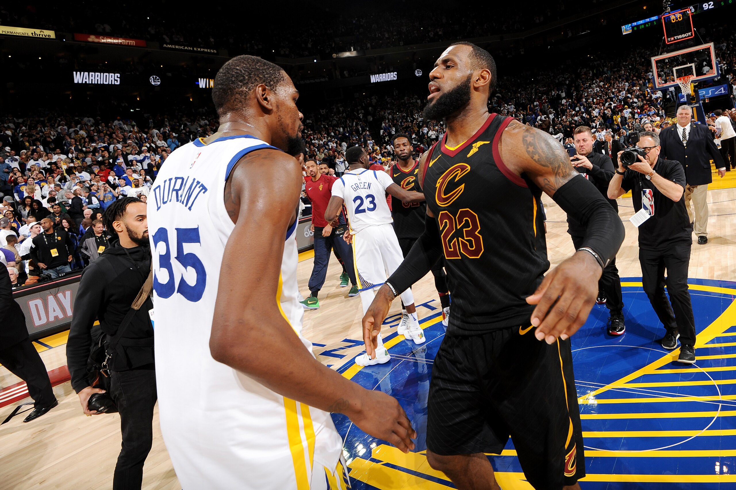 OAKLAND, CA - DECEMBER 25: Kevin Durant #35 of the Golden State Warriors exchanges a hug with LeBron James #23 of the Cleveland Cavaliers after the game between the two teams on December 25, 2017 at ORACLE Arena in Oakland, California. NOTE TO USER: User 