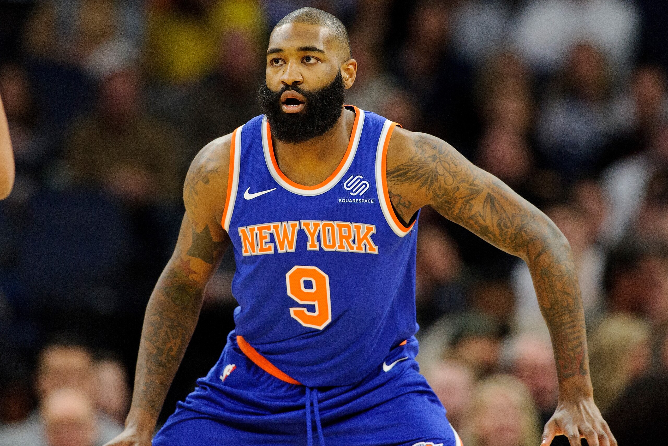 MINNEAPOLIS, MN - JANUARY 12: Kyle O'Quinn #9 of the New York Knicks defends against the Minnesota Timberwolves during the game on January 12, 2018 at the Target Center in Minneapolis, Minnesota. NOTE TO USER: User expressly acknowledges and agrees that, 