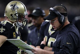NEW ORLEANS, LA - DECEMBER 17:  Drew Brees #9 of the New Orleans Saints and head coach Sean Payton talk during the first half of a game against the New York Jets at the Mercedes-Benz Superdome on December 17, 2017 in New Orleans, Louisiana.  (Photo by Chr