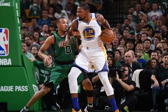 BOSTON, MA - NOVEMBER 18:  Kevin Durant #35 of the Golden State Warriors handles the ball against Avery Bradley #0 of the Boston Celtics during a game on November 18, 2016 at TD Garden in Boston, Massachusetts. NOTE TO USER: User expressly acknowledges an