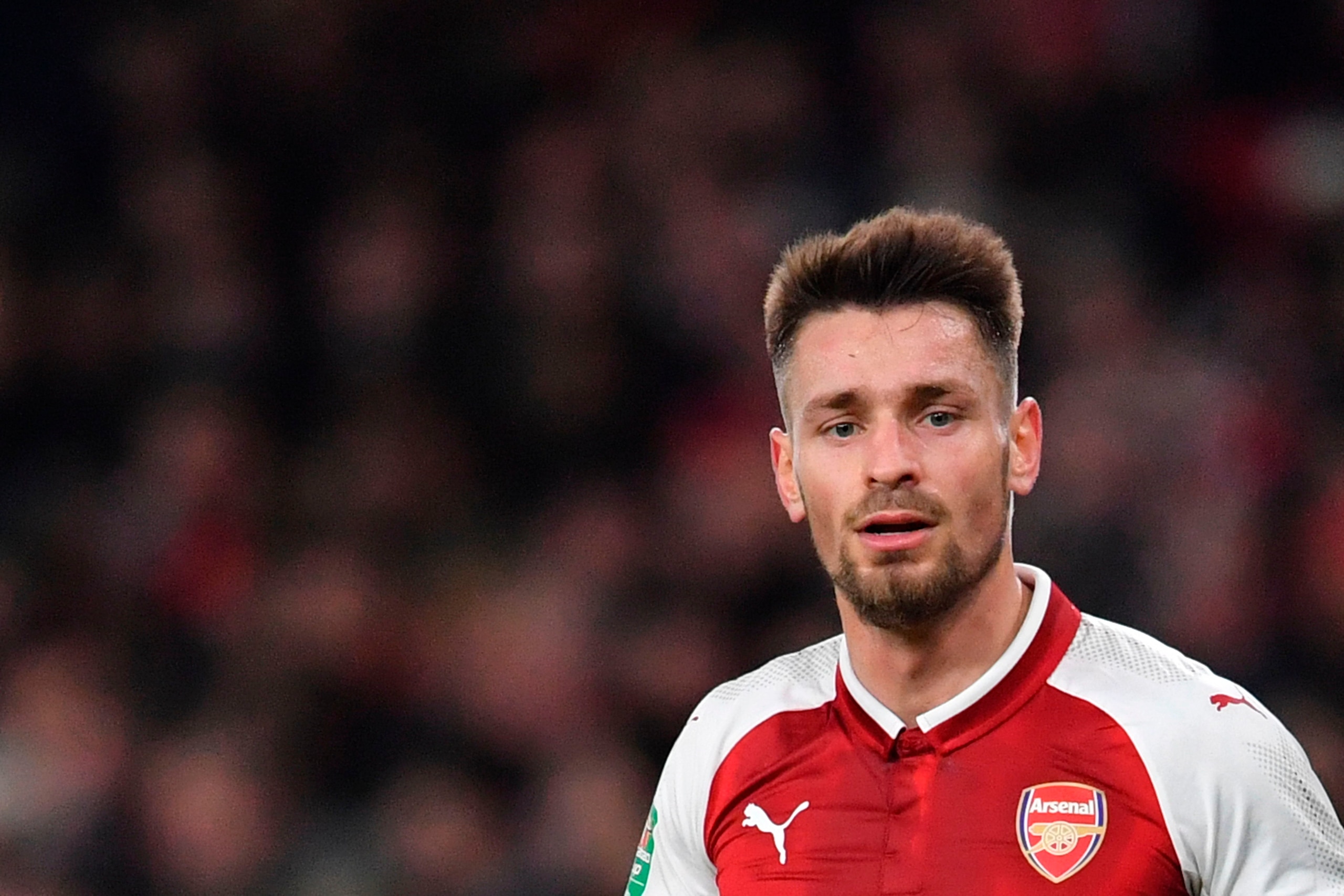 Arsenal's French defender Mathieu Debuchy plays during the English League Cup quarter-final football match between Arsenal and West Ham United at the Emirates Stadium in London on December 19, 2017.  / AFP PHOTO / Ben STANSALL / RESTRICTED TO EDITORIAL US