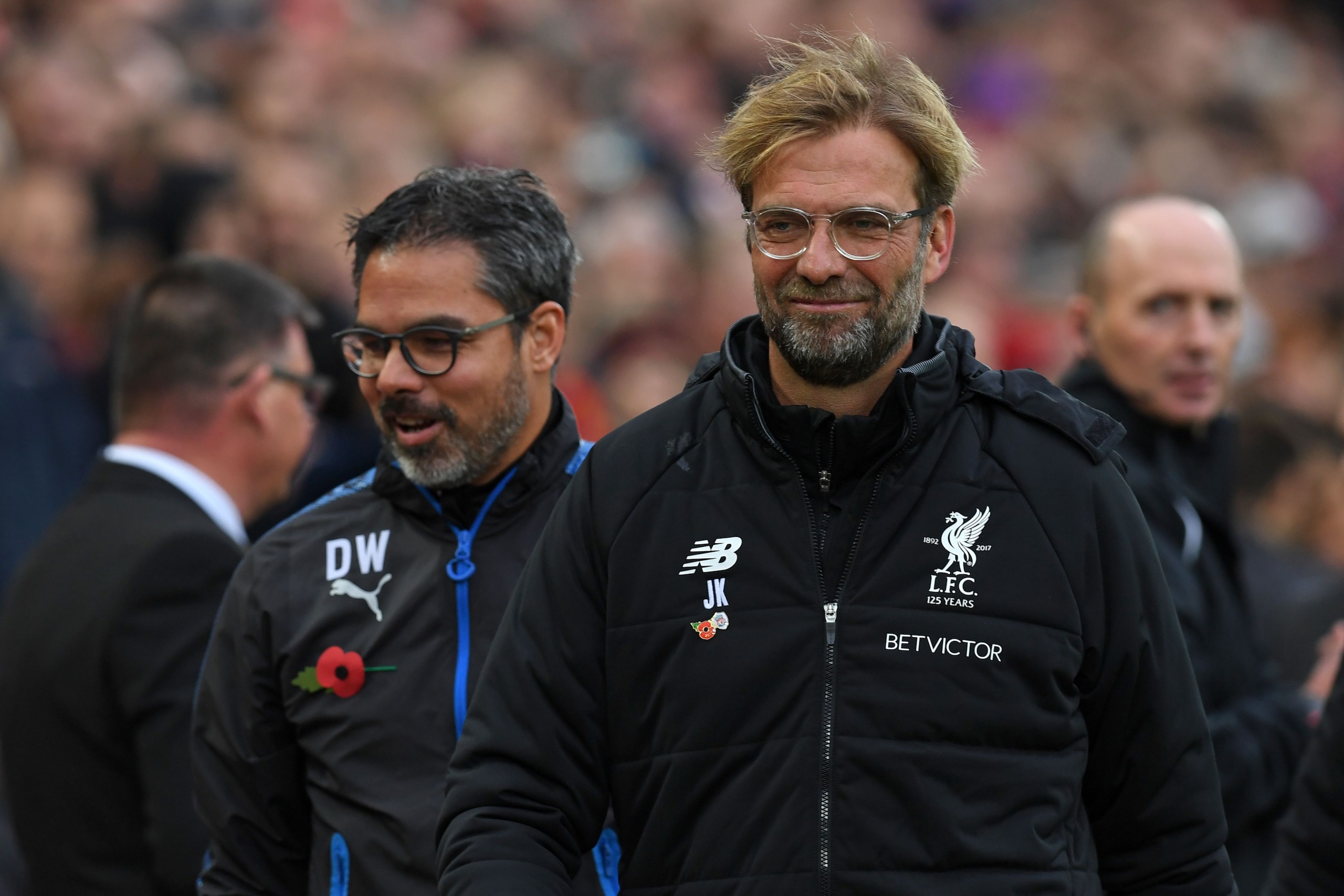 Huddersfield Town's German head coach David Wagner (L) and Liverpool's German manager Jurgen Klopp arrive for the English Premier League football match between Liverpool and Huddersfield Town at Anfield in Liverpool, north west England on October 28, 2017