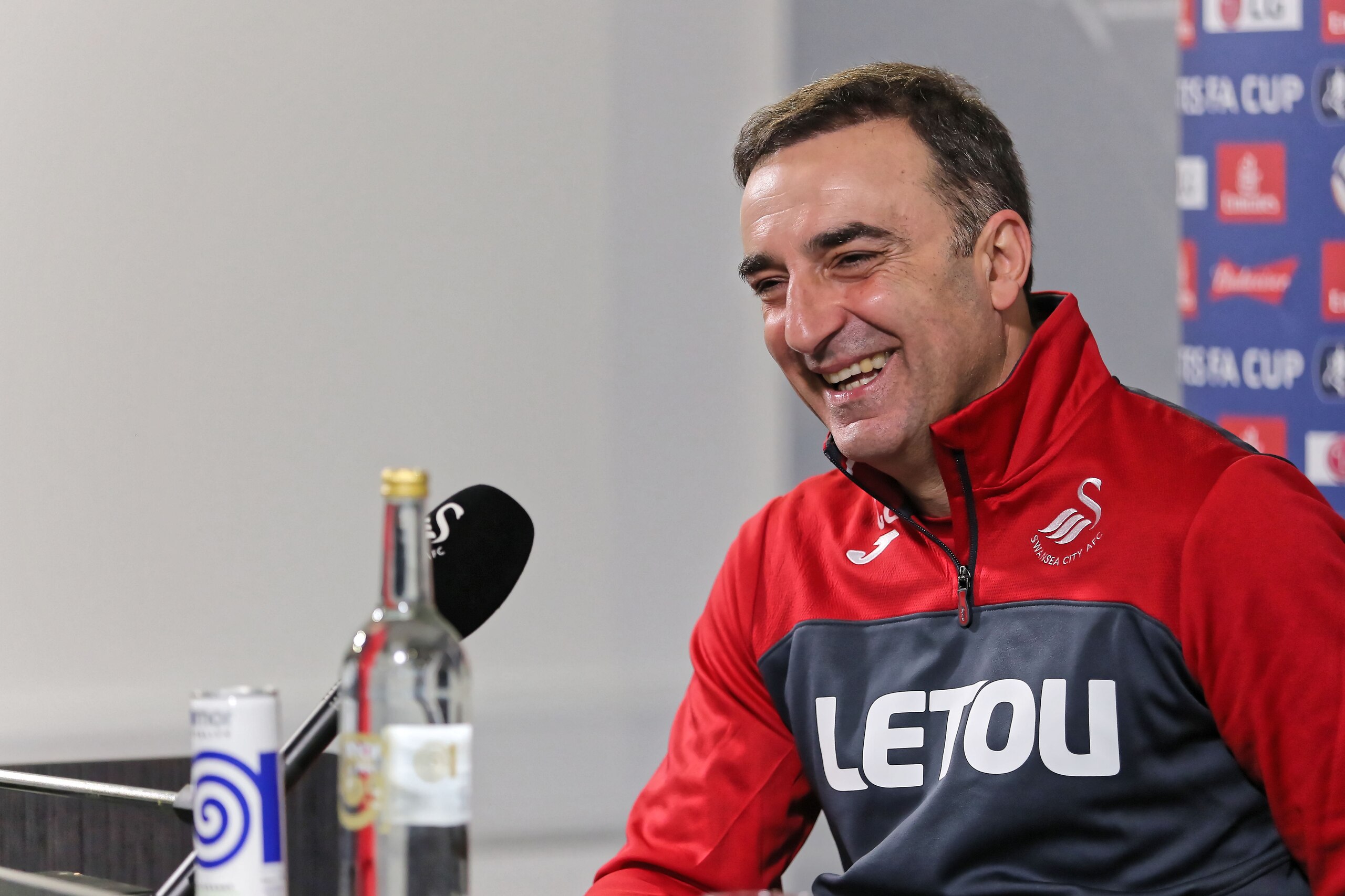 SWANSEA, WALES - JANUARY 25: Manager Carlos Carvalhal speaks to members of the press during the Swansea City Training and Press Conference at The Fairwood Training Ground on January 25, 2018 in Swansea, Wales. (Photo by Athena Pictures/Getty Images)