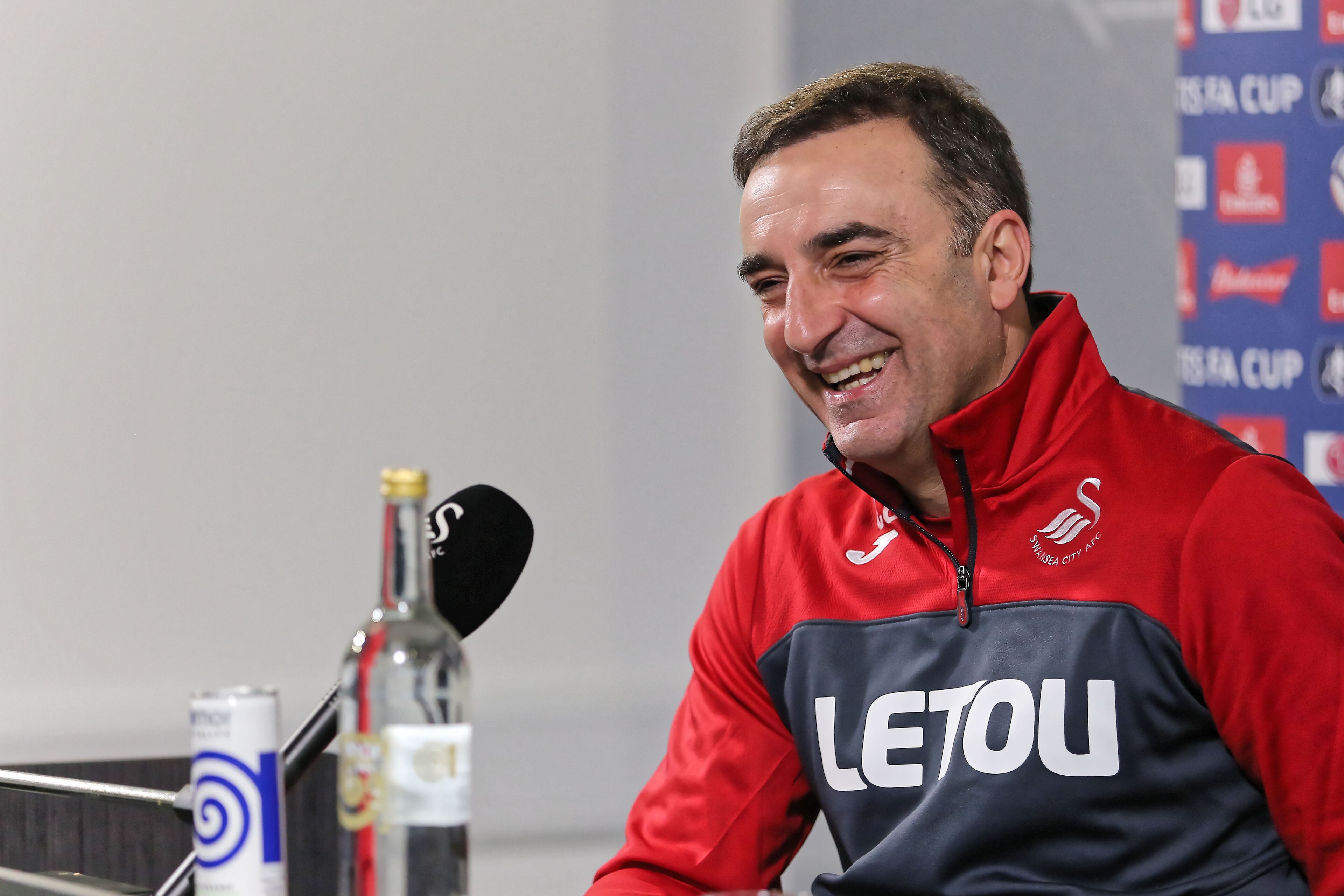 SWANSEA, WALES - JANUARY 25: Manager Carlos Carvalhal speaks to members of the press during the Swansea City Training and Press Conference at The Fairwood Training Ground on January 25, 2018 in Swansea, Wales. (Photo by Athena Pictures/Getty Images)