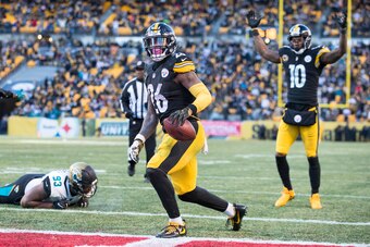 PITTSBURGH, PA - JANUARY 14:  Le'Veon Bell #26 of the Pittsburgh Steelers and Martavis Bryant #10 celebrate a touchdown scored during the second half of the AFC Divisional Playoff game against the Jacksonville Jaguars at Heinz Field on January 14, 2018 in