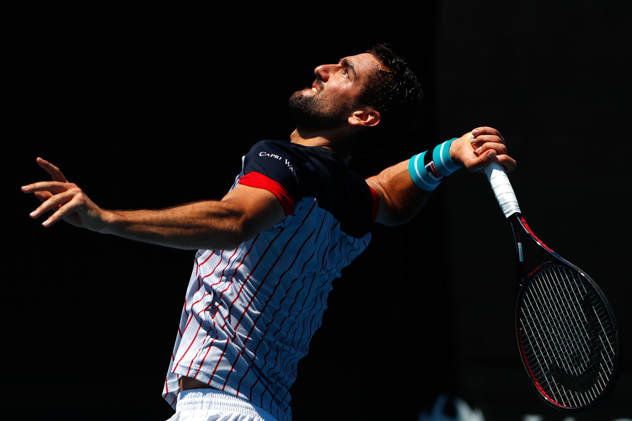 MELBOURNE, AUSTRALIA - JANUARY 27:  Marin Cilic of Croatia serves during a practice session on day 13 of the 2018 Australian Open at Melbourne Park on January 27, 2018 in Melbourne, Australia.  (Photo by Michael Dodge/Getty Images)