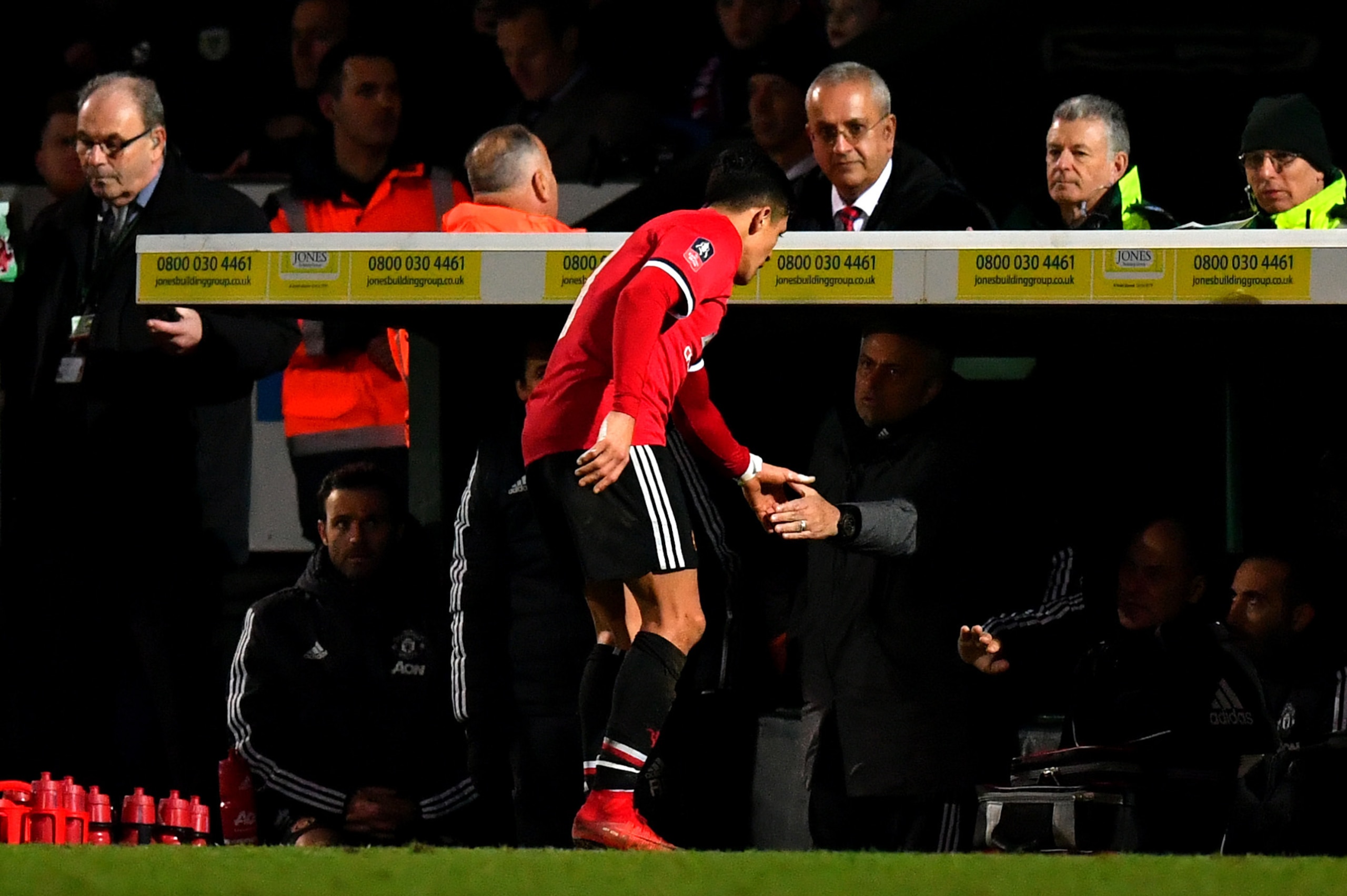 YEOVIL, ENGLAND - JANUARY 26:  Alexis Sanchez of Manchester United shakes hands with Jose Mourinho, Manager of Manchester United as he is substituted during The Emirates FA Cup Fourth Round match between Yeovil Town and Manchester United at Huish Park on 