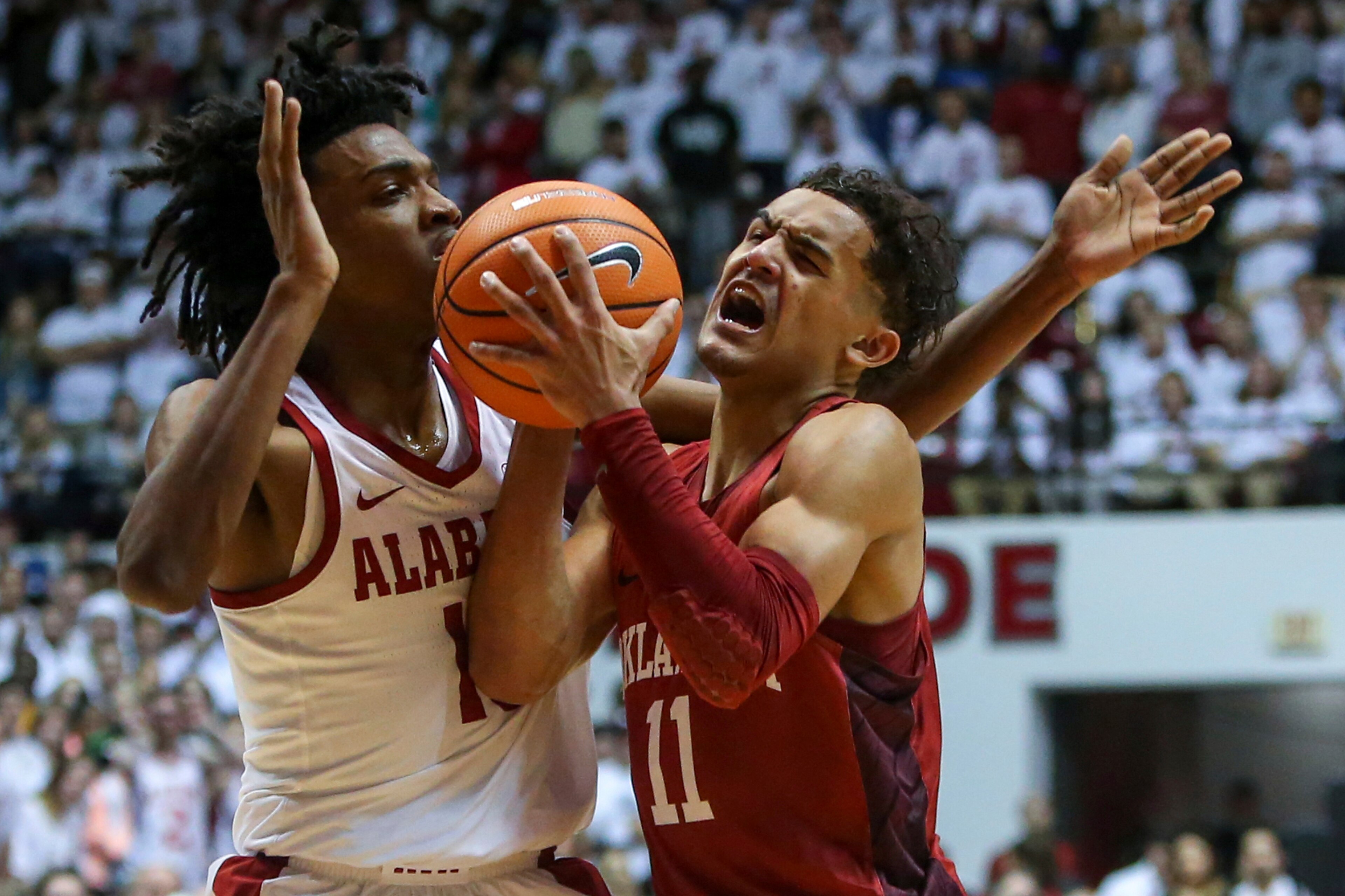 Trae Young guarded by Herb Jones