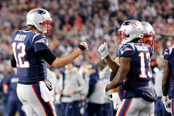 FOXBOROUGH, MA - JANUARY 21: Tom Brady #12 of the New England Patriots reacts with Phillip Dorsett #13 in the second half  during the AFC Championship Game against the Jacksonville Jaguars at Gillette Stadium on January 21, 2018 in Foxborough, Massachuset