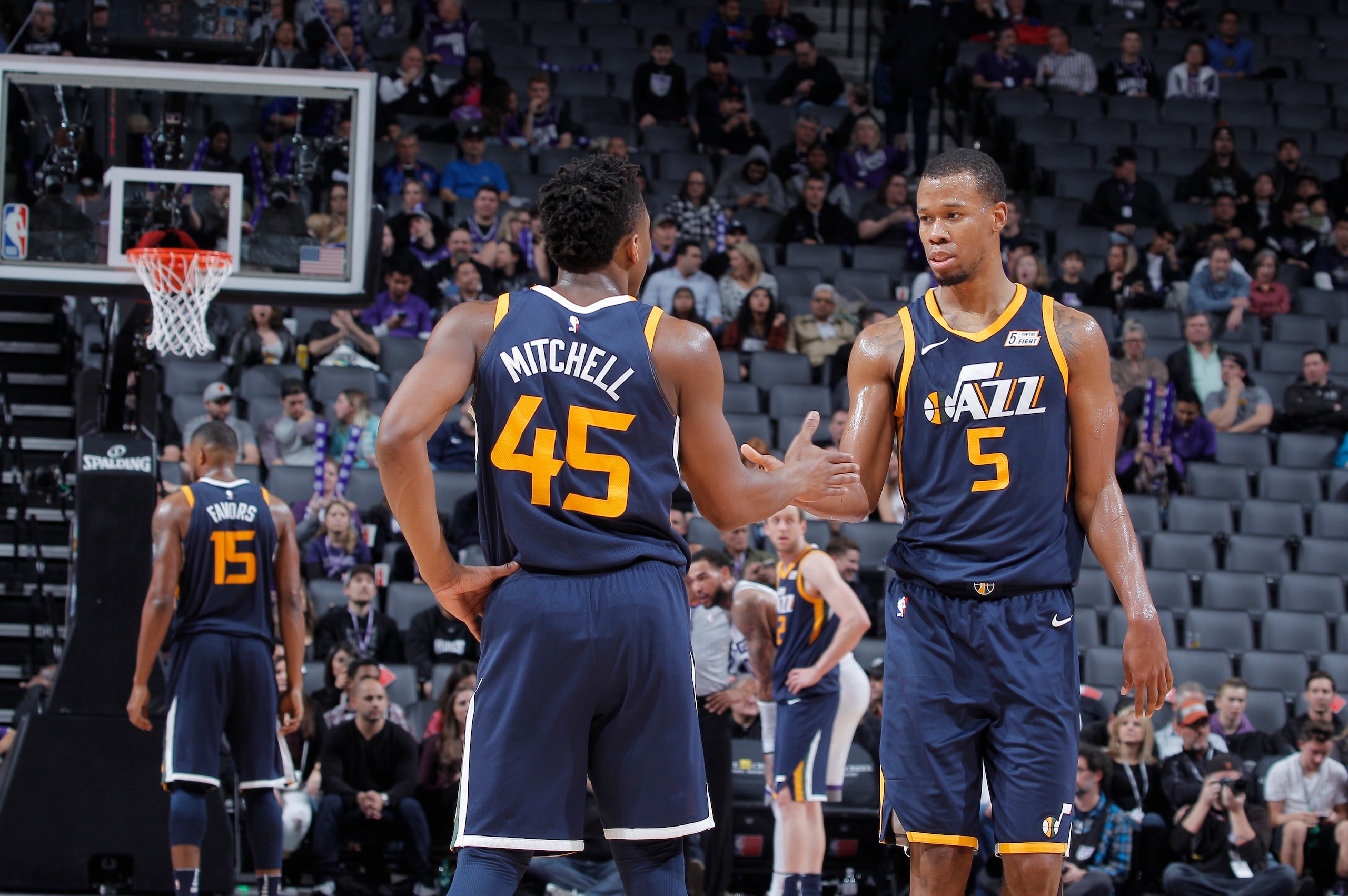 SACRAMENTO, CA - JANUARY 17: Donovan Mitchell #45 and Rodney Hood #5 of the Utah Jazz high five during the game against the Sacramento Kings on January 17, 2018 at Golden 1 Center in Sacramento, California. NOTE TO USER: User expressly acknowledges and ag