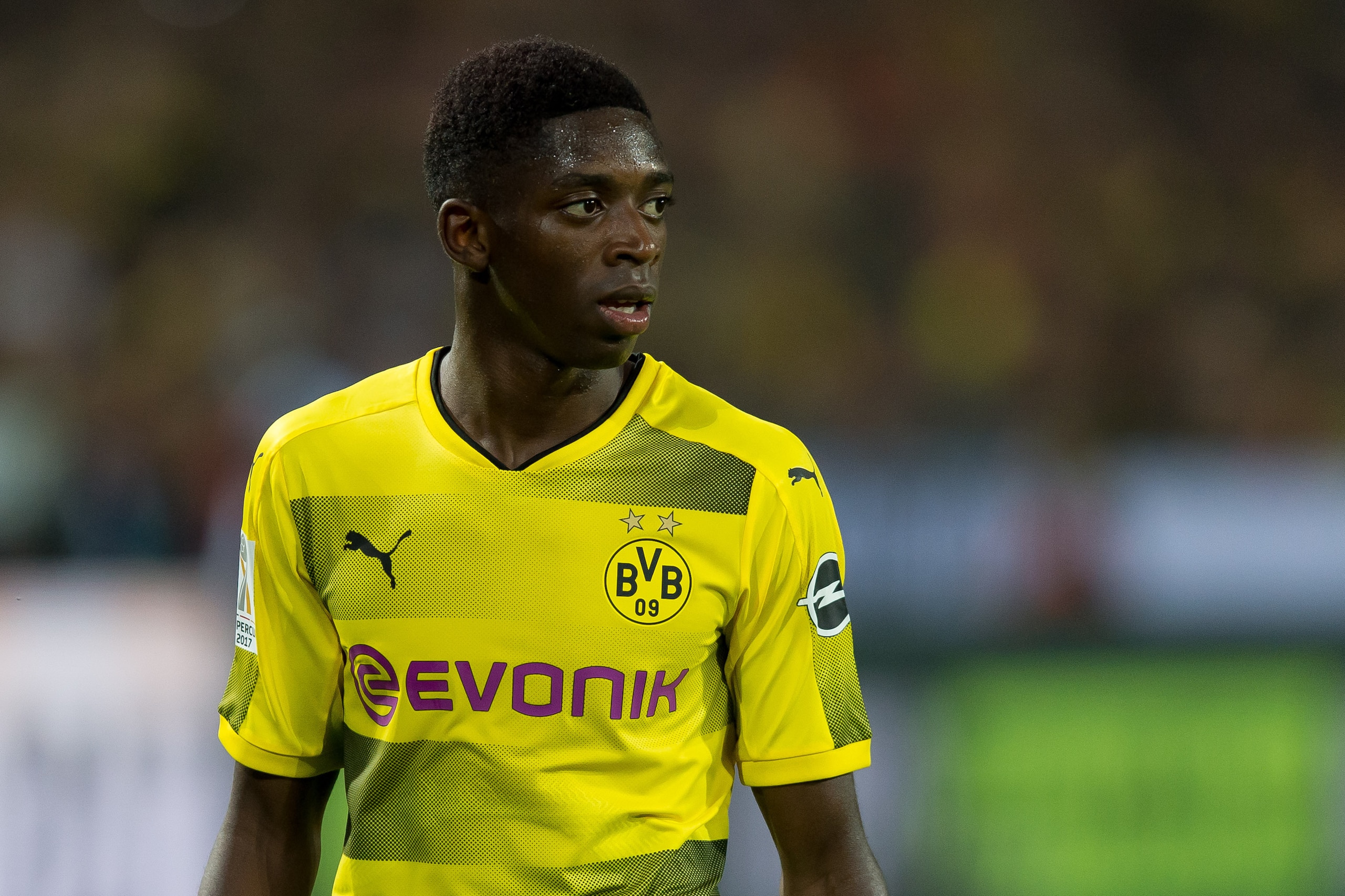 DORTMUND, GERMANY - AUGUST 05: Ousmane Dembele of Dortmund looks on during the DFL Supercup 2017 match between Borussia Dortmund and Bayern Muenchen at Signal Iduna Park on August 5, 2017 in Dortmund, Germany. (Photo by TF-Images/TF-Images via Getty Image DORTMUND, GERMANY - AUGUST 05: Ousmane Dembele of Dortmund looks on during the DFL Supercup 2017 match between Borussia Dortmund and Bayern Muenchen at Signal Iduna Park on August 5, 2017 in Dortmund, Germany. (Photo by TF-Images/TF-Images via Getty Image
