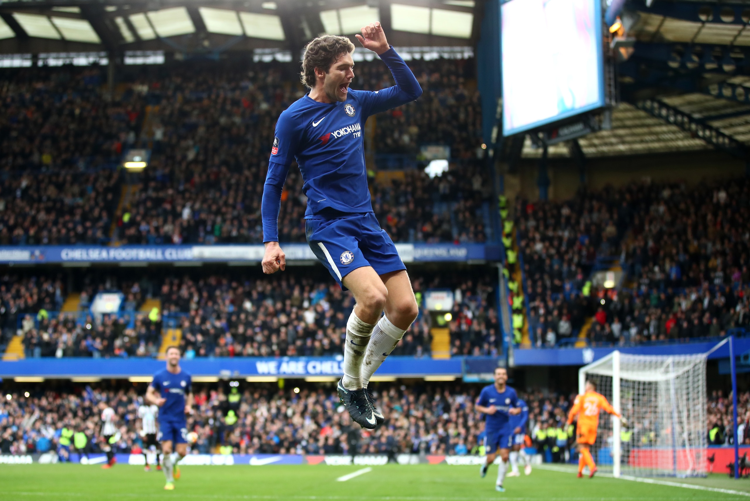 LONDON, ENGLAND - JANUARY 28:  Marcos Alonso of Chelsea celebrates after scoring his sides third goal during The Emirates FA Cup Fourth Round match between Chelsea and Newcastle on January 28, 2018 in London, United Kingdom.  (Photo by Julian Finney/Getty