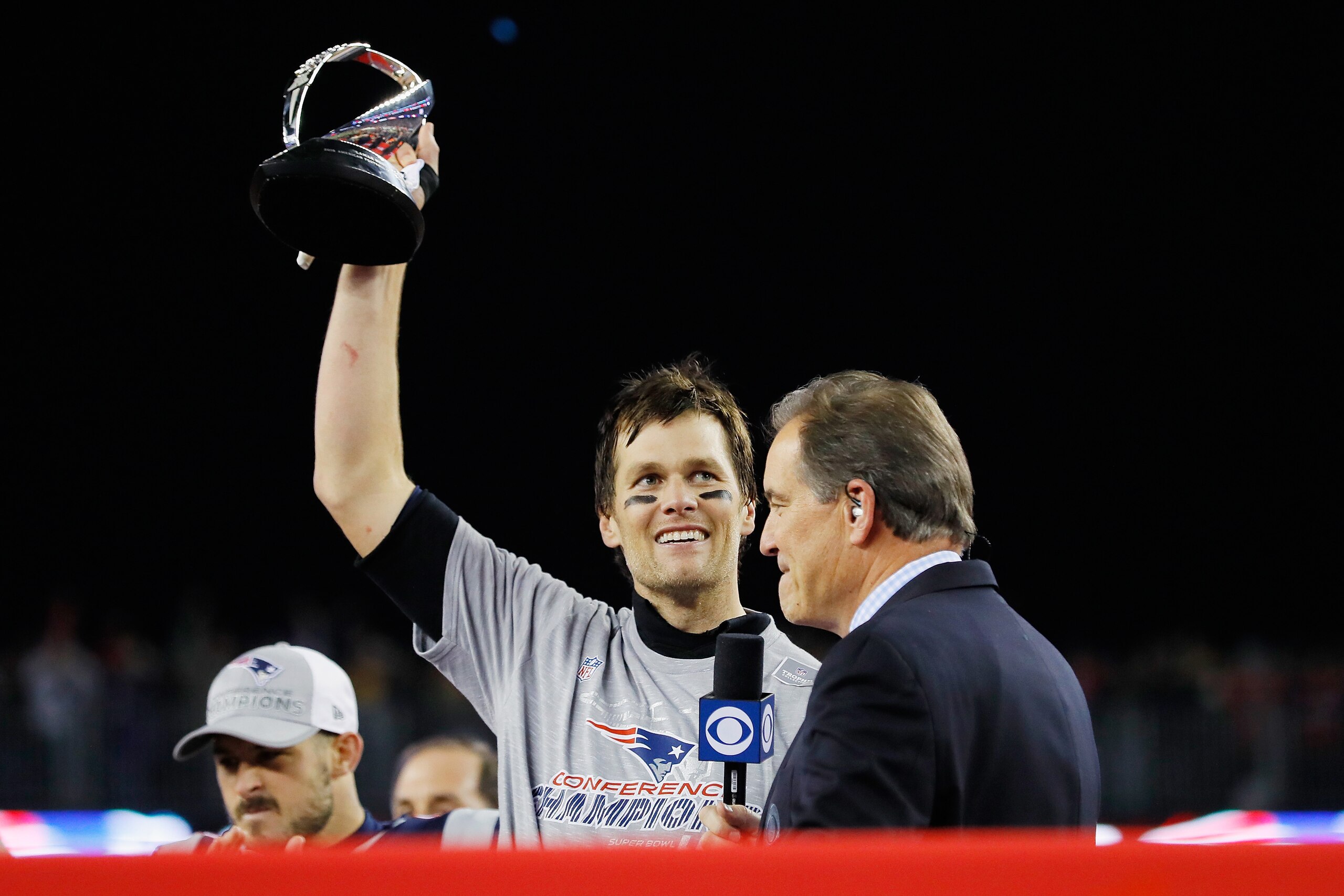FOXBOROUGH, MA - JANUARY 21: Tom Brady #12 of the New England Patriots holds the Lamar Hunt trophy as he is interviewed by Jim Nantz after the AFC Championship Game against the Jacksonville Jaguars at Gillette Stadium on January 21, 2018 in Foxborough, FOXBOROUGH, MA - JANUARY 21: Tom Brady #12 of the New England Patriots holds the Lamar Hunt trophy as he is interviewed by Jim Nantz after the AFC Championship Game against the Jacksonville Jaguars at Gillette Stadium on January 21, 2018 in Foxborough,