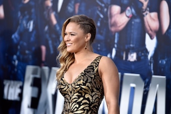 HOLLYWOOD, CA - AUGUST 11:  Actress  Ronda Rousey arrives at the Premiere Of Lionsgate Films' 'The Expendables 3' at TCL Chinese Theatre on August 11, 2014 in Hollywood, California.  (Photo by Frazer Harrison/Getty Images)