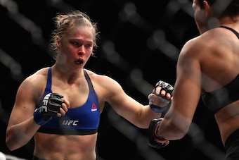 LAS VEGAS, NV - DECEMBER 30:  (L-R) Ronda Rousey and Amanda Nunes of Brazil face off in their UFC women's bantamweight championship bout during the UFC 207 event at T-Mobile Arena on December 30, 2016 in Las Vegas, Nevada.  (Photo by Christian Petersen/Ge