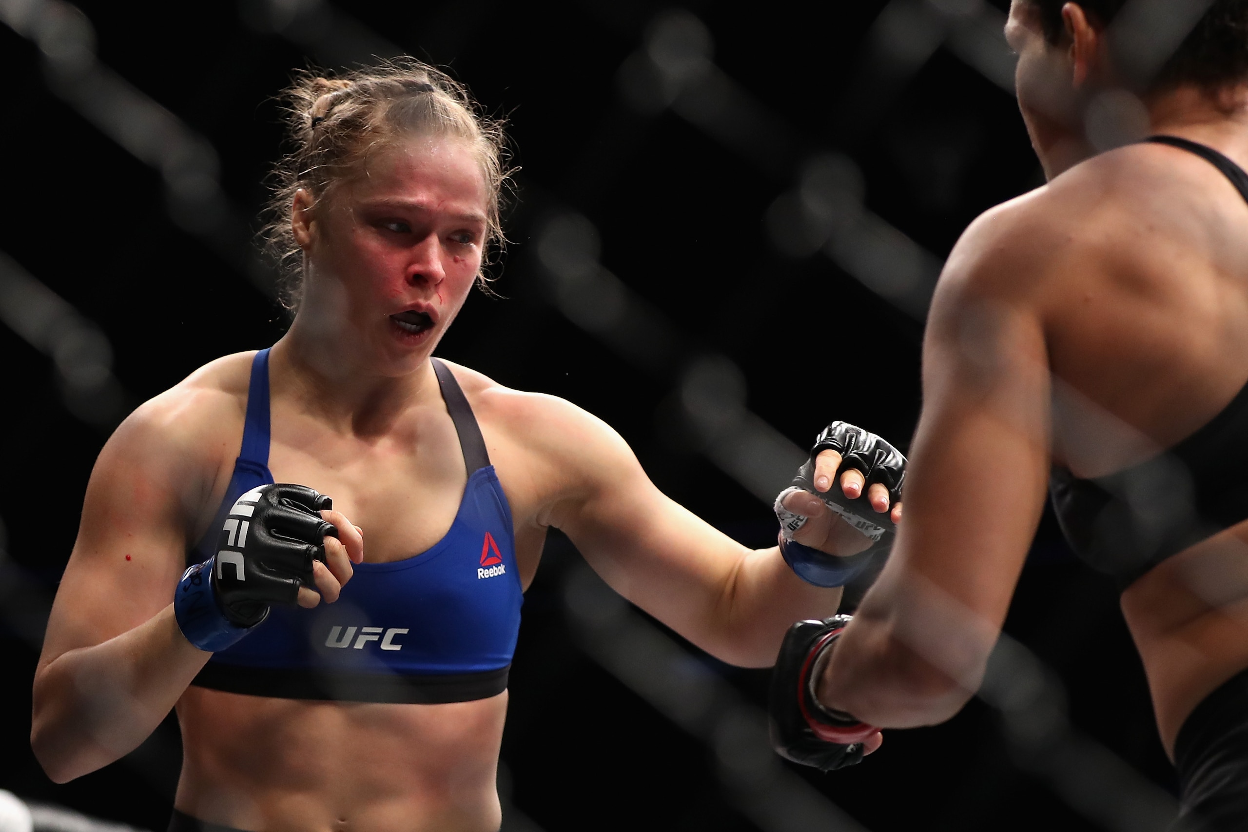 LAS VEGAS, NV - DECEMBER 30:  (L-R) Ronda Rousey and Amanda Nunes of Brazil face off in their UFC women's bantamweight championship bout during the UFC 207 event at T-Mobile Arena on December 30, 2016 in Las Vegas, Nevada.  (Photo by Christian Petersen/Ge