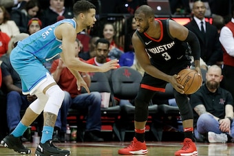 HOUSTON, TX - DECEMBER 13:  Chris Paul #3 of the Houston Rockets looks to drive on Michael Carter-Williams #10 of the Charlotte Hornets in the fourth qaurter at Toyota Center on December 13, 2017 in Houston, Texas. NOTE TO USER: User expressly acknowledge
