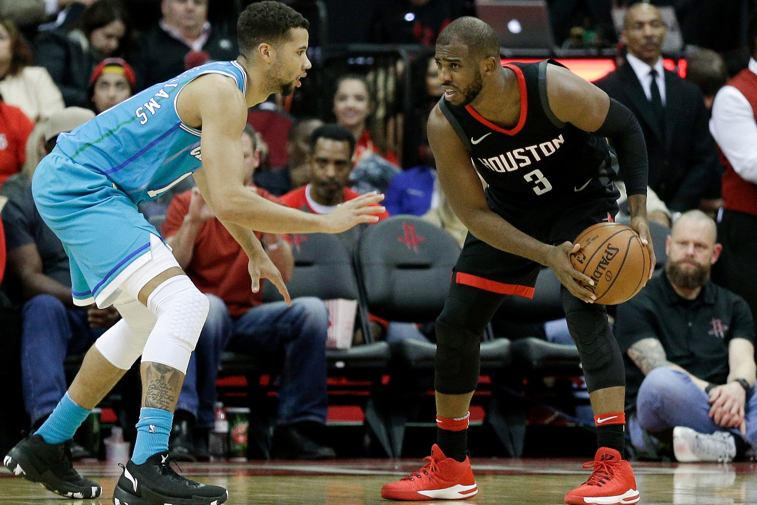 HOUSTON, TX - DECEMBER 13:  Chris Paul #3 of the Houston Rockets looks to drive on Michael Carter-Williams #10 of the Charlotte Hornets in the fourth qaurter at Toyota Center on December 13, 2017 in Houston, Texas. NOTE TO USER: User expressly acknowledge