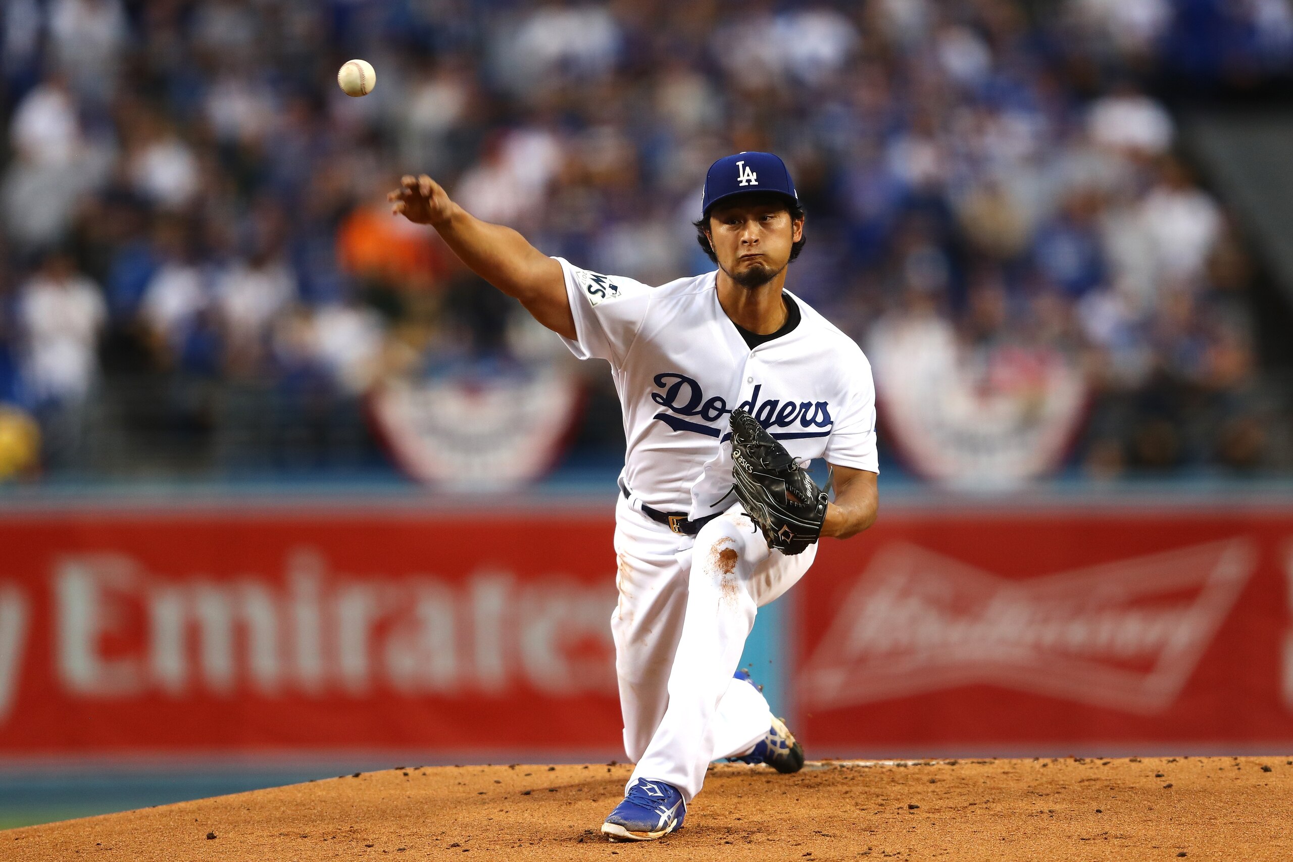 LOS ANGELES, CA - NOVEMBER 01:  Yu Darvish #21 of the Los Angeles Dodgers pitches in the first inning against the Houston Astros in game seven of the 2017 World Series at Dodger Stadium on November 1, 2017 in Los Angeles, California.  (Photo by Tim Bradbu