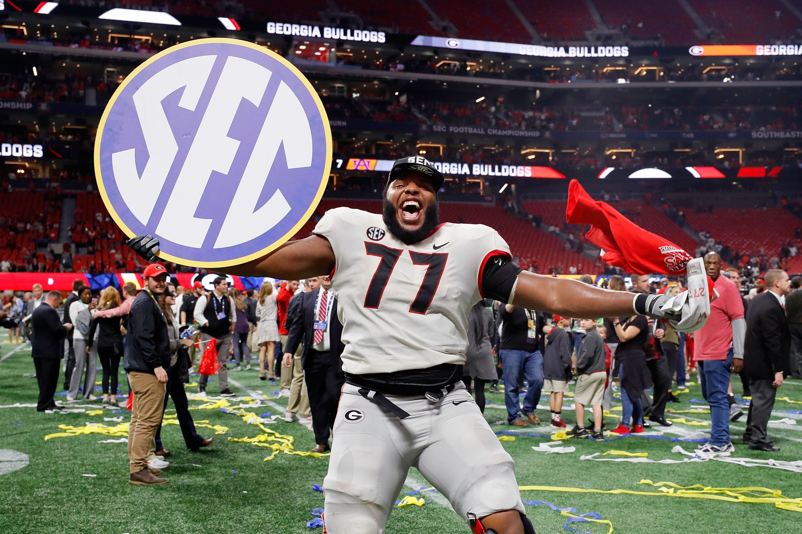 ATLANTA, GA - DECEMBER 02: Isaiah Wynn #77 of the Georgia Bulldogs celebrates beating the Auburn Tigers in the SEC Championship at Mercedes-Benz Stadium on December 2, 2017 in Atlanta, Georgia. (Photo by Kevin C.  Cox/Getty Images)