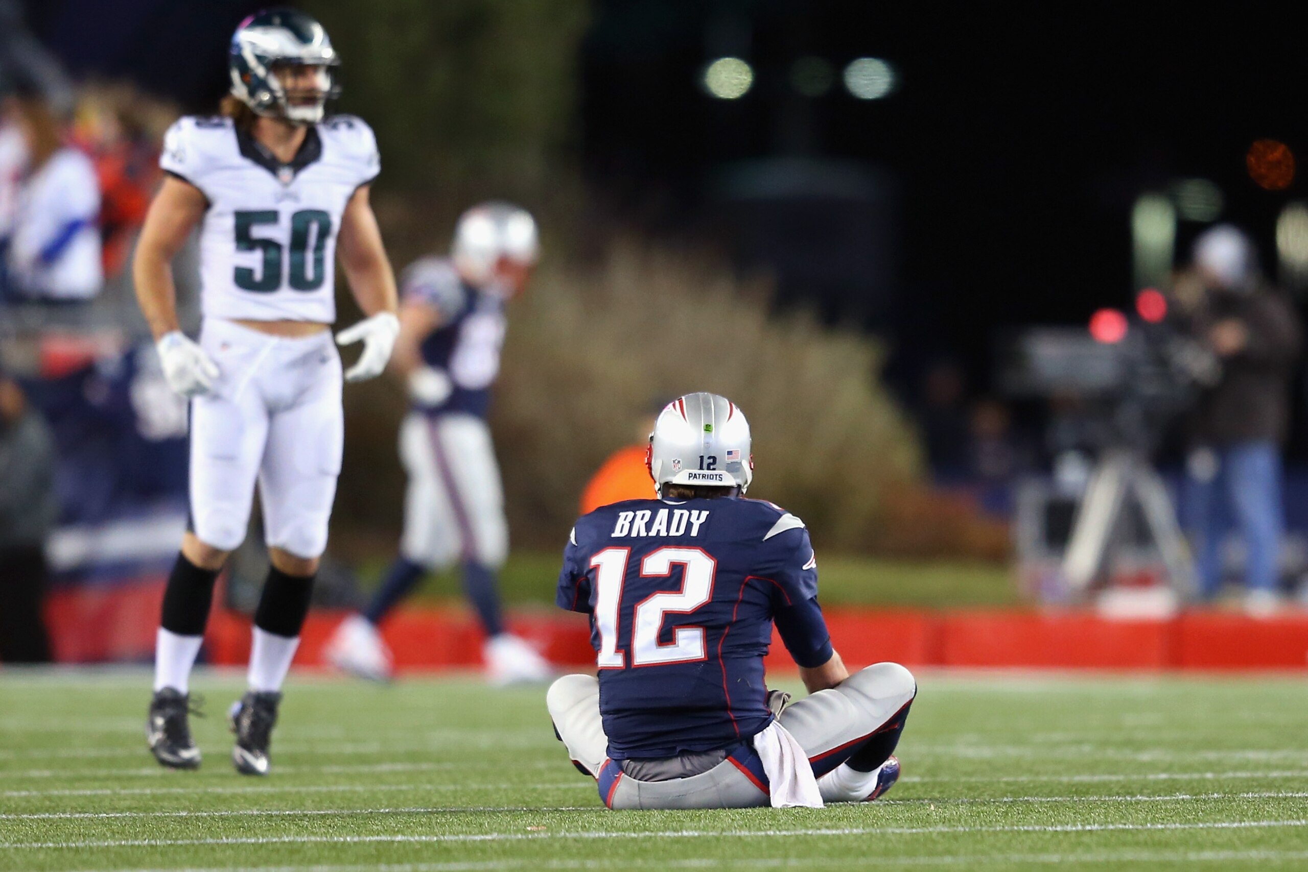 FOXBORO, MA - DECEMBER 06:  Tom Brady #12 of the New England Patriots reacts after throwing an interception during the third quarter against the Philadelphia Eagles at Gillette Stadium on December 6, 2015 in Foxboro, Massachusetts.  (Photo by Jim Rogash/G