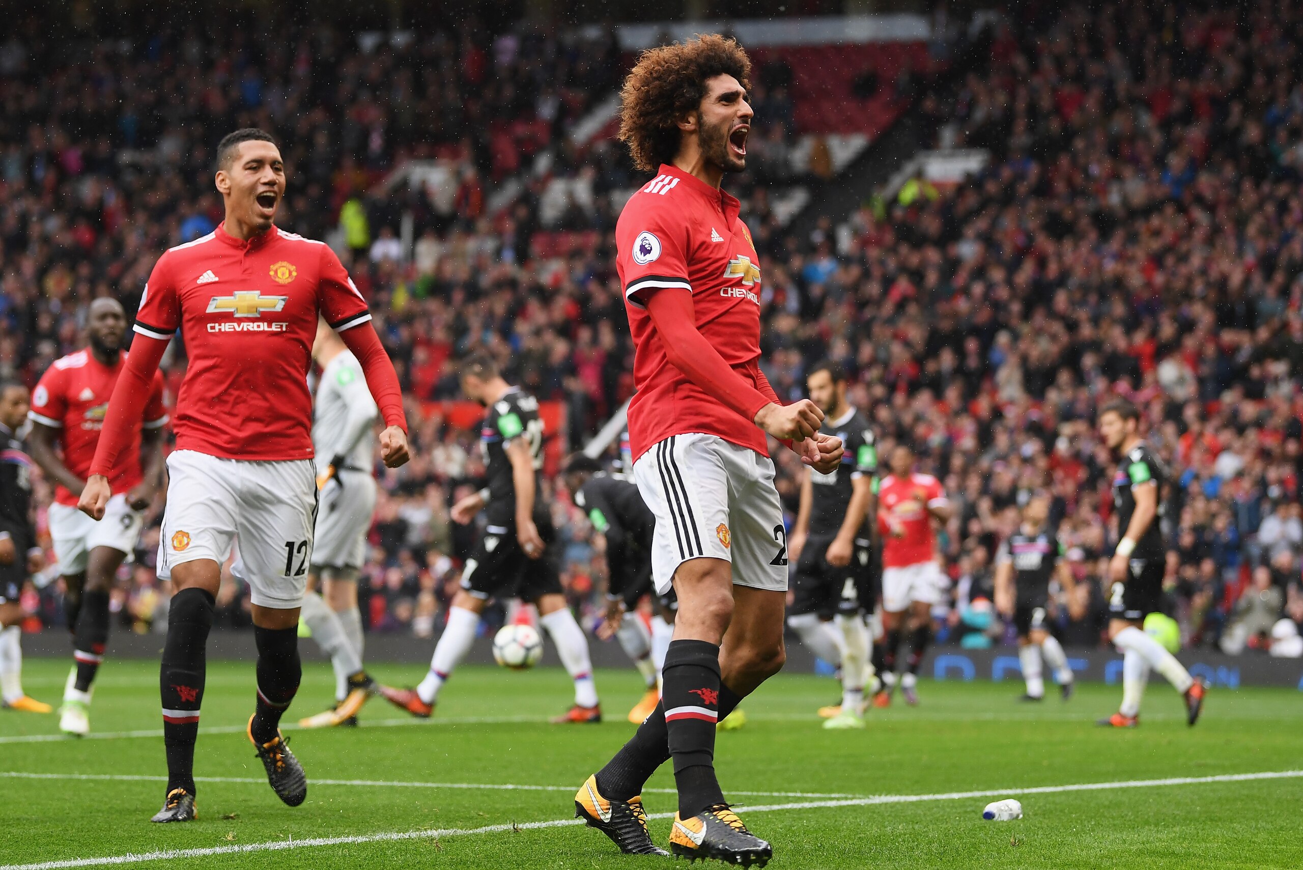 MANCHESTER, ENGLAND - SEPTEMBER 30:  Marouane Fellaini of Manchester United celebrates scroing his side's third goal during the Premier League match between Manchester United and Crystal Palace at Old Trafford on September 30, 2017 in Manchester, England.