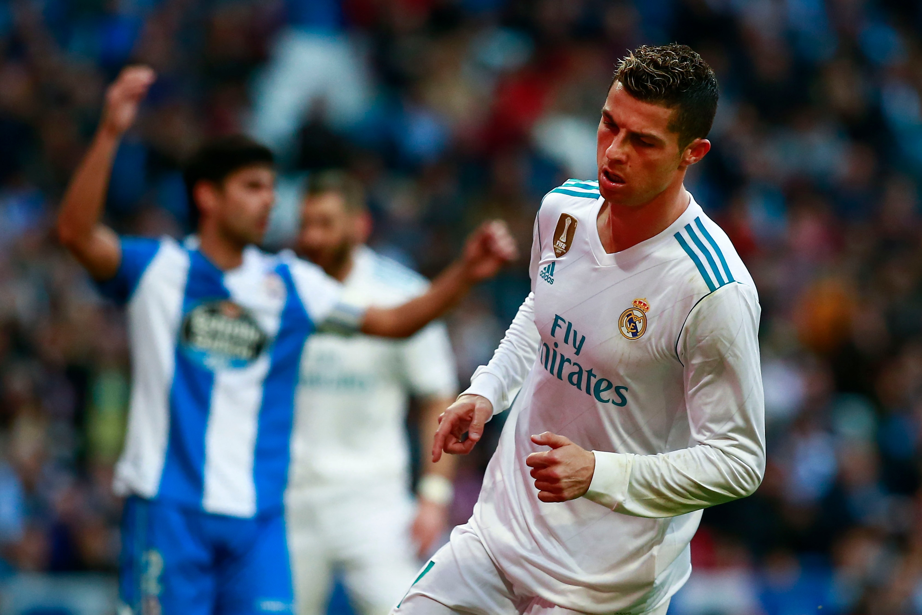 MADRID, SPAIN - JANUARY 21: Cristiano Ronaldo of Real Madrid CF celebrates scoring their fifth goal during the La Liga match between Real Madrid CF and Deportivo La Coruna at Estadio Santiago Bernabeu on January 21, 2018 in Madrid, Spain. (Photo by Gonzal