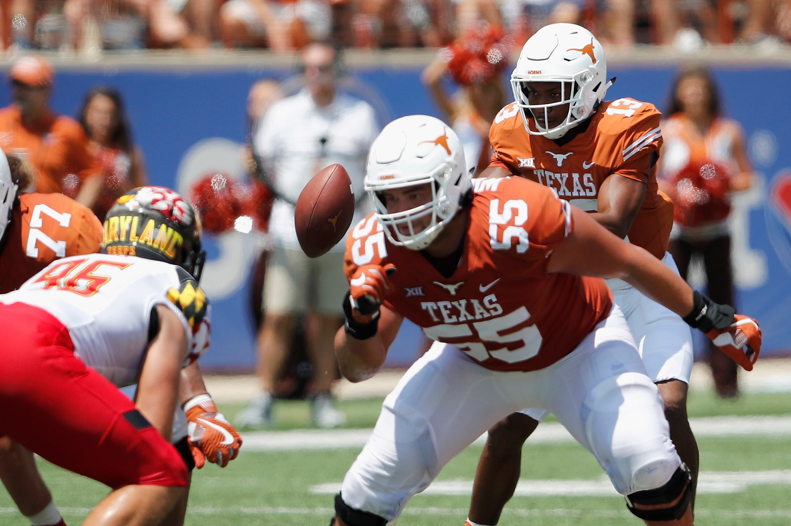 AUSTIN, TX - SEPTEMBER 02: Jerrod Heard #13 of the Texas Longhorns takes a direct snap in the third quarter against the Maryland Terrapins at Darrell K Royal-Texas Memorial Stadium on September 2, 2017 in Austin, Texas. (Photo by Tim Warner/Getty Images AUSTIN, TX - SEPTEMBER 02: Jerrod Heard #13 of the Texas Longhorns takes a direct snap in the third quarter against the Maryland Terrapins at Darrell K Royal-Texas Memorial Stadium on September 2, 2017 in Austin, Texas. (Photo by Tim Warner/Getty Images