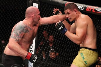 BELEM, BRAZIL - FEBRUARY 03:  (L-R) Timothy Johnson punches Marcelo Golm of Brazil in their heavyweight bout during the UFC Fight Night event at Mangueirinho Arena on February 03, 2018 in Belem, Brazil. (Photo by Buda Mendes/Zuffa LLC/Zuffa LLC via Getty 