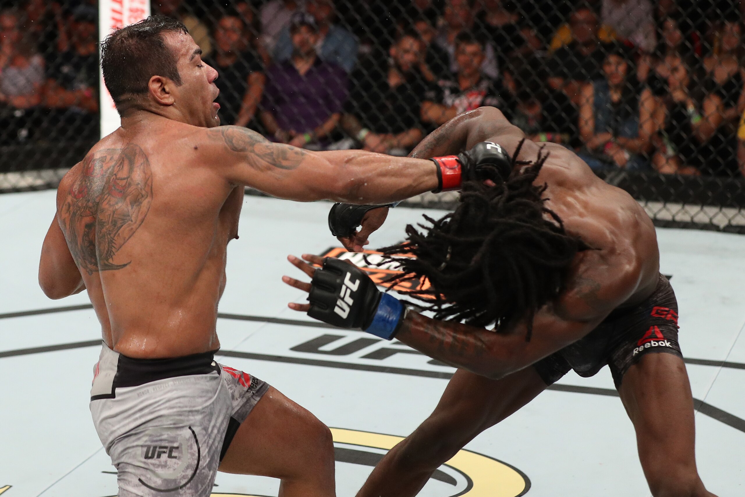 BELEM, BRAZIL - FEBRUARY 03:  (L-R) Michel Prazeres of Brazil punches Desmond Green in their lightweight bout during the UFC Fight Night event at Mangueirinho Arena on February 03, 2018 in Belem, Brazil. (Photo by Buda Mendes/Zuffa LLC/Zuffa LLC via Getty