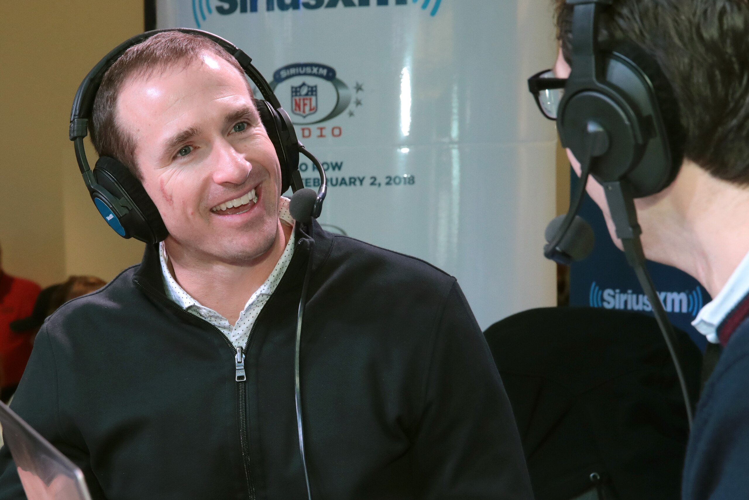 MINNEAPOLIS, MN - FEBRUARY 02:  Drew Brees of the New Orleans Saints (L) and SiriusXM radio host Adam Schein attends SiriusXM at Super Bowl LII Radio Row at the Mall of America on February 2, 2018 in Bloomington, Minnesota.  (Photo by Cindy Ord/Getty Imag