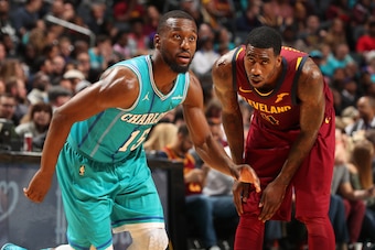 CHARLOTTE, NC - NOVEMBER 15:  Kemba Walker #15 of the Charlotte Hornets looks to box out Iman Shumpert #4 of the Cleveland Cavaliers on November 15, 2017 at Spectrum Center in Charlotte, North Carolina. NOTE TO USER: User expressly acknowledges and agrees