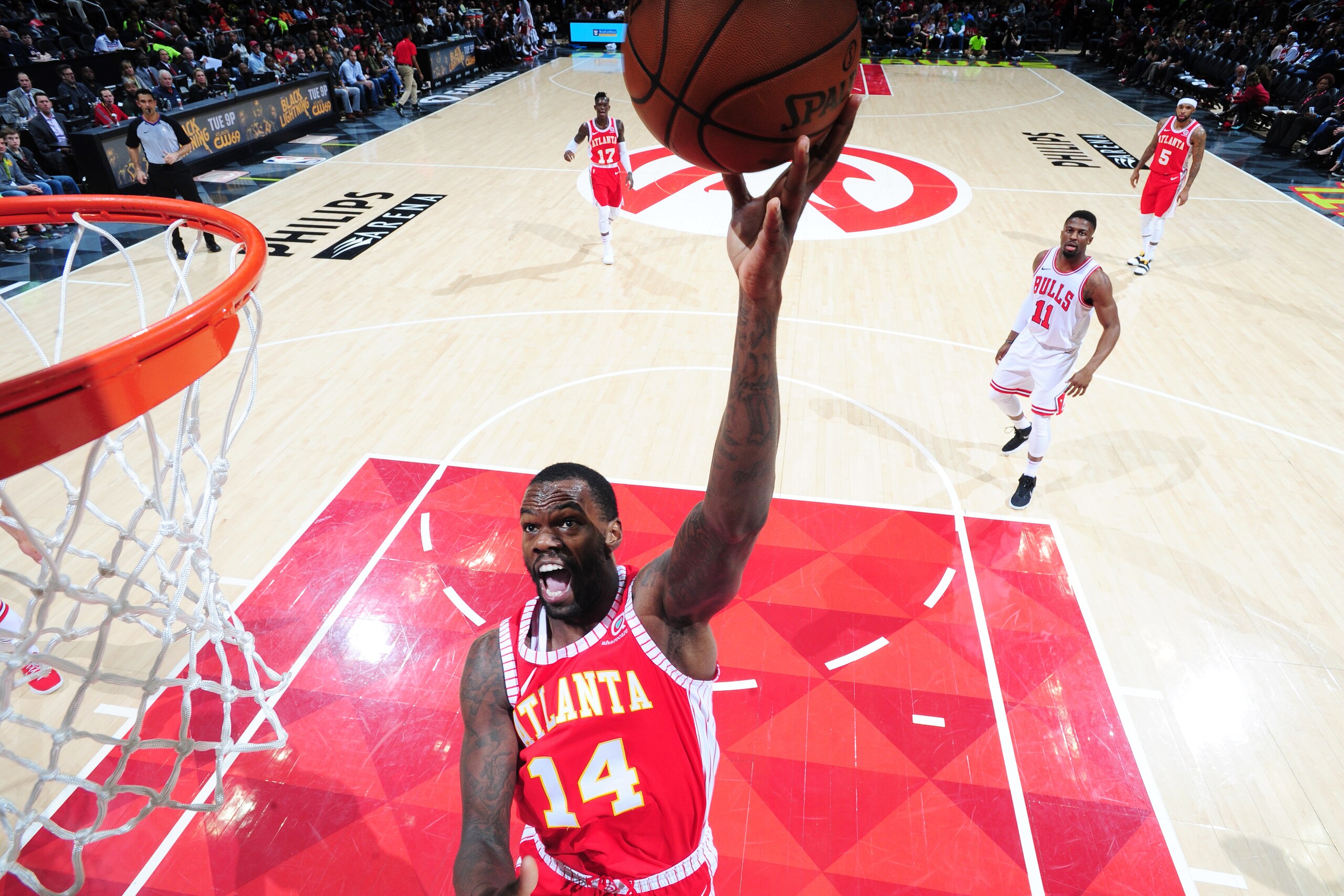 ATLANTA, GA - JANUARY 20:  Dewayne Dedmon #14 of the Atlanta Hawks dunks against the Chicago Bulls on January 20, 2018 at Philips Arena in Atlanta, Georgia.  NOTE TO USER: User expressly acknowledges and agrees that, by downloading and/or using this Photo
