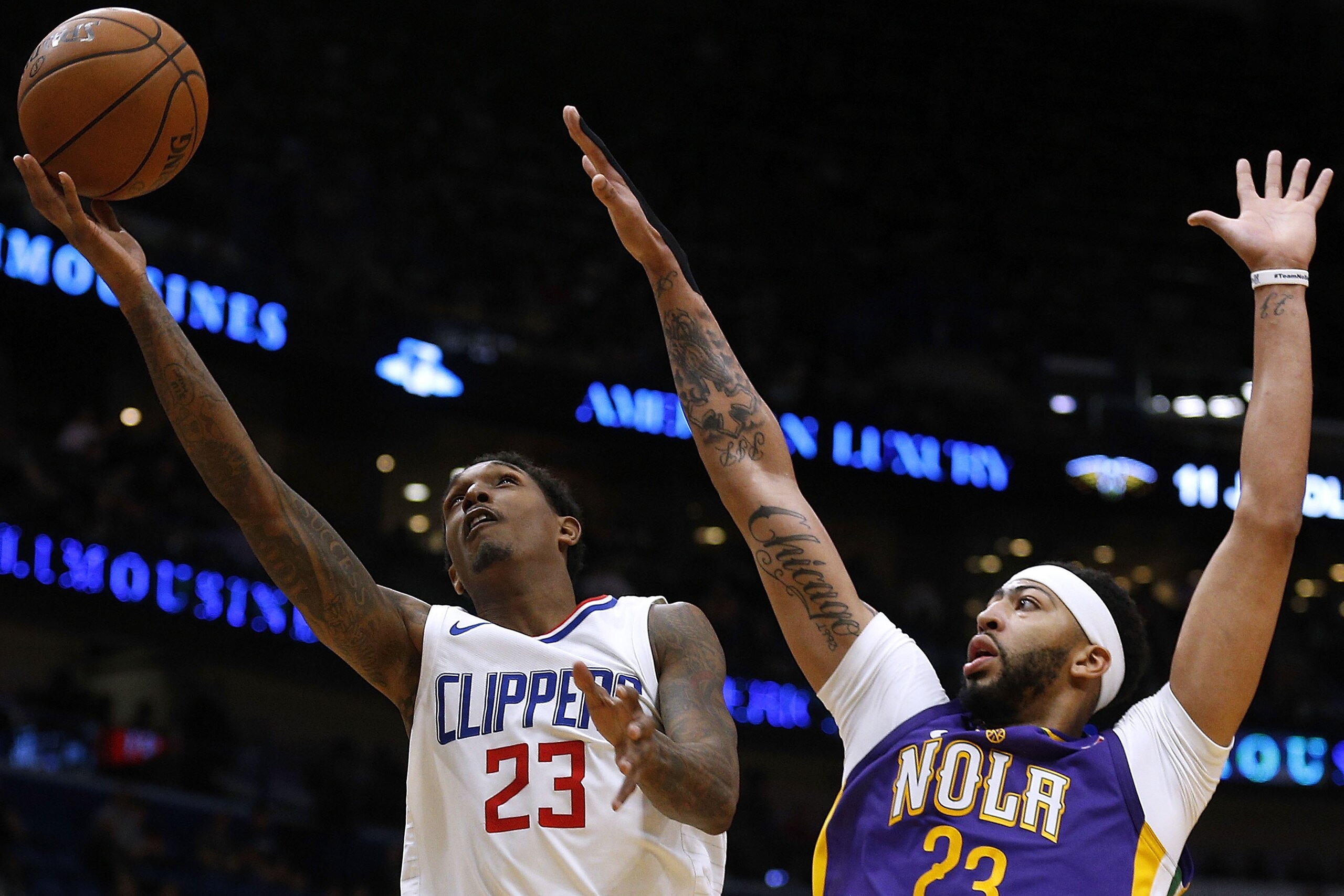 NEW ORLEANS, LA - JANUARY 28: Lou Williams #23 of the LA Clippers shoots against Anthony Davis #23 of the New Orleans Pelicans during the second half at the Smoothie King Center on January 28, 2018 in New Orleans, Louisiana. NOTE TO USER: User expressly a