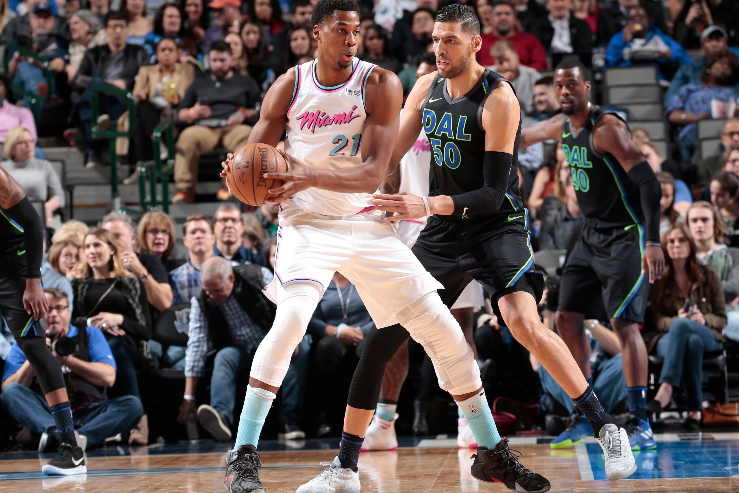 DALLAS, TX - JANUARY 29: Hassan Whiteside #21 of the Miami Heat handles the ball against the Dallas Mavericks on January 29, 2018 at the American Airlines Center in Dallas, Texas. NOTE TO USER: User expressly acknowledges and agrees that, by downloading a