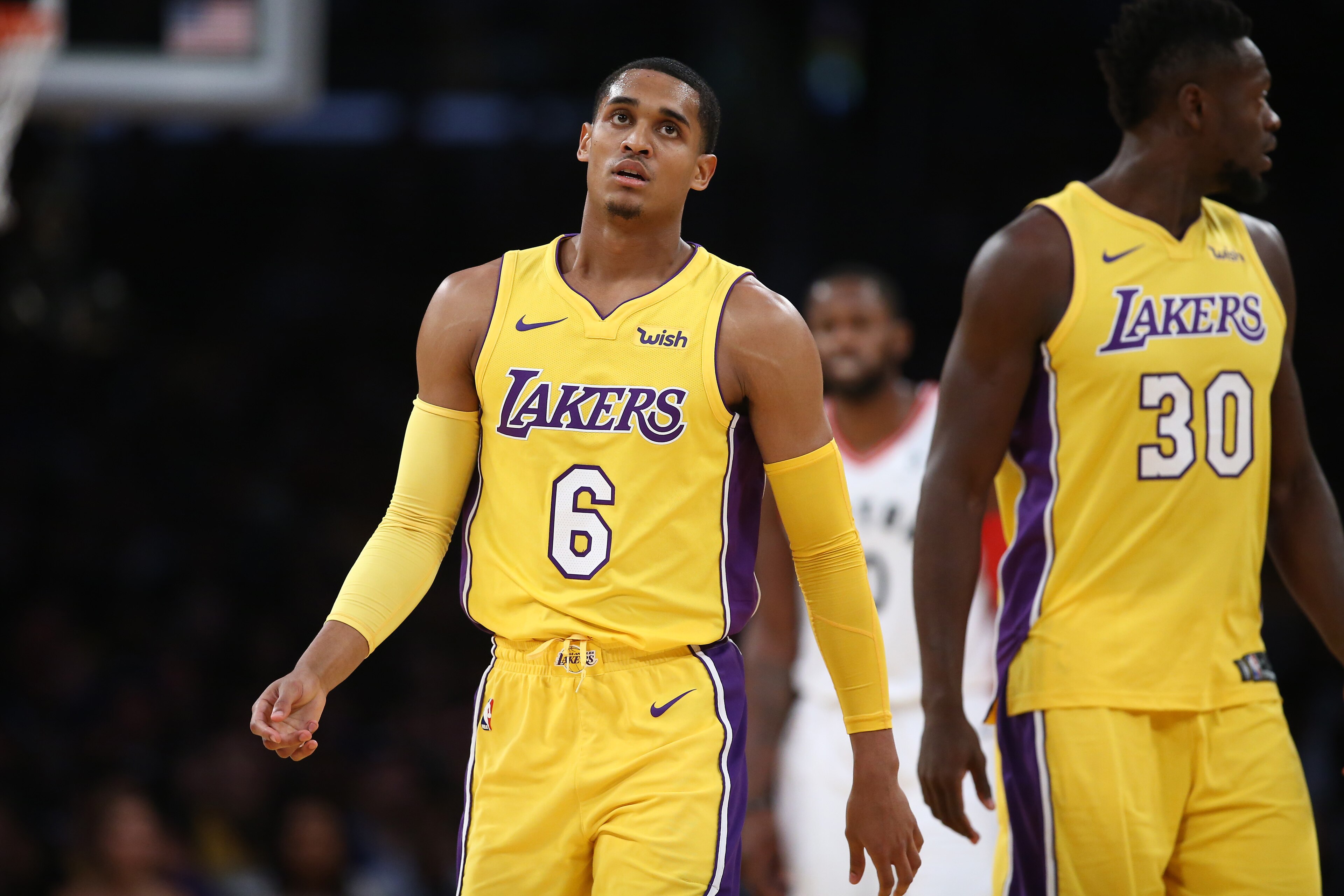 LOS ANGELES, CA - OCTOBER 27:  Jordan Clarkson #6 and Julius Randle #30 of the Los Angeles Lakers look on during the first half of a game against the Toronto Raptors  at Staples Center on October 27, 2017 in Los Angeles, California.  NOTE TO USER: User ex