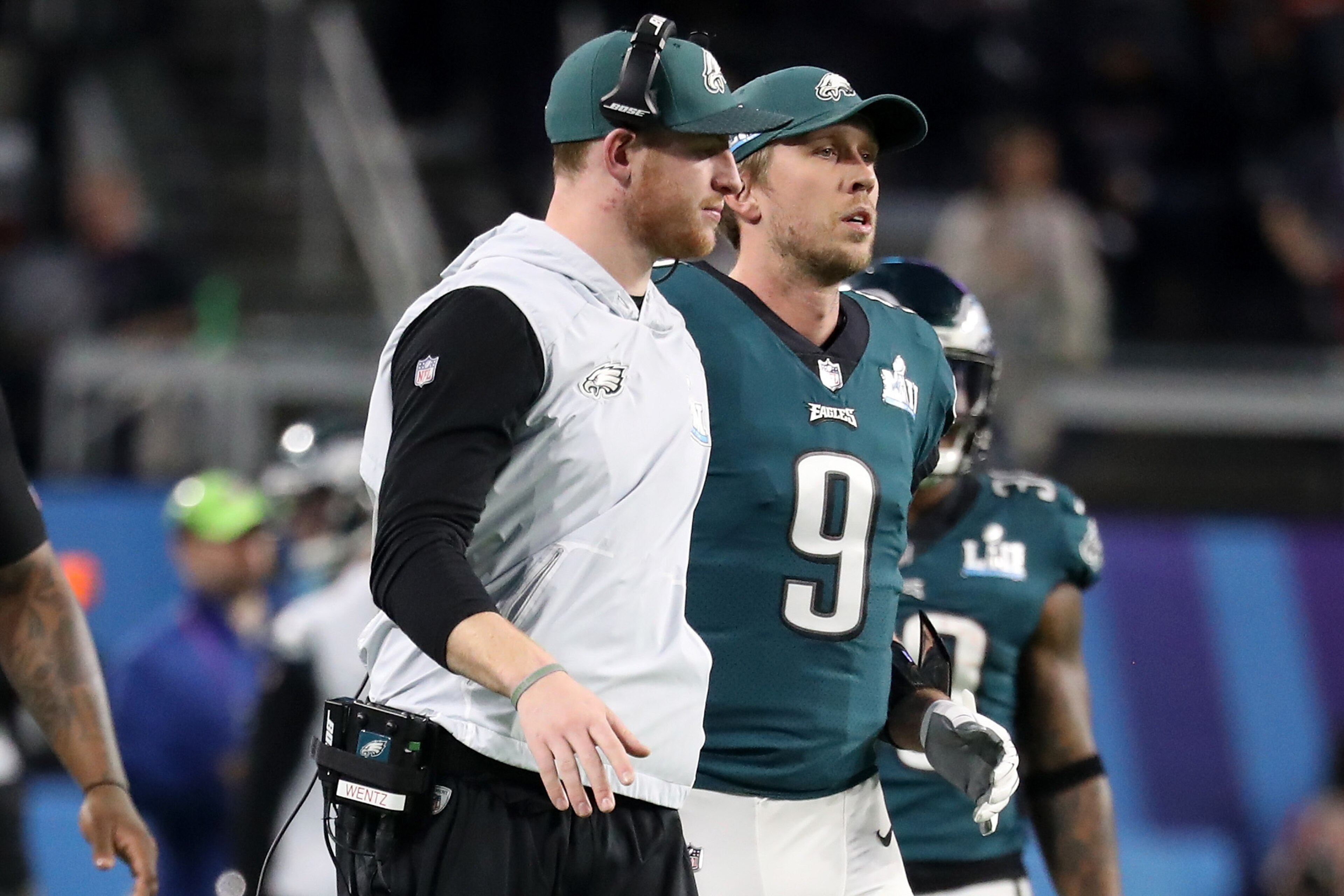 MINNEAPOLIS, MN - FEBRUARY 04: Carson Wentz #11 and Nick Foles #9 of the Philadelphia Eagles look on during the first quarter against the New England Patriots in Super Bowl LII at U.S. Bank Stadium on February 4, 2018 in Minneapolis, Minnesota.  (Photo by
