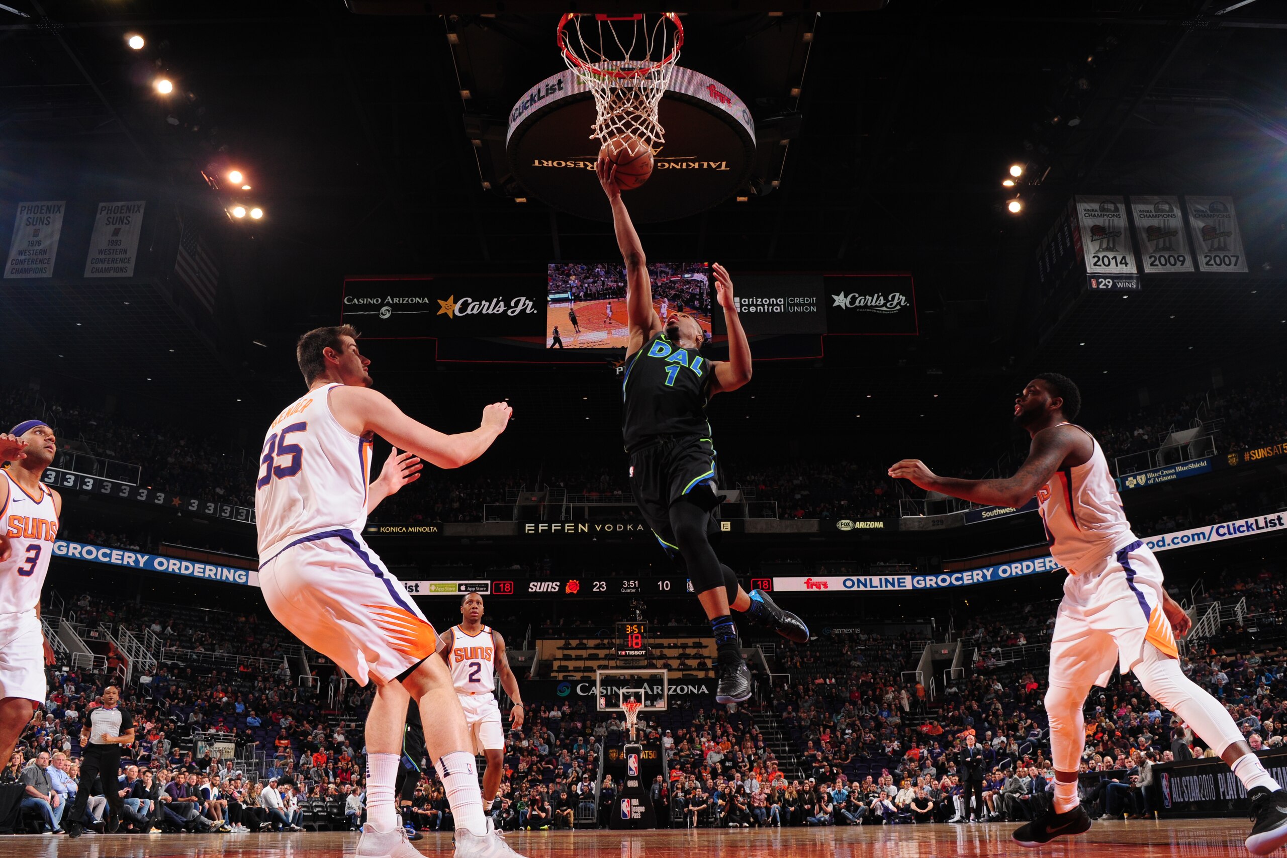 PHOENIX, AZ - JANUARY 31:  Dennis Smith Jr. #1 of the Dallas Mavericks goes to the basket against the Phoenix Suns on January 31, 2018 at Talking Stick Resort Arena in Phoenix, Arizona. NOTE TO USER: User expressly acknowledges and agrees that, by downloa