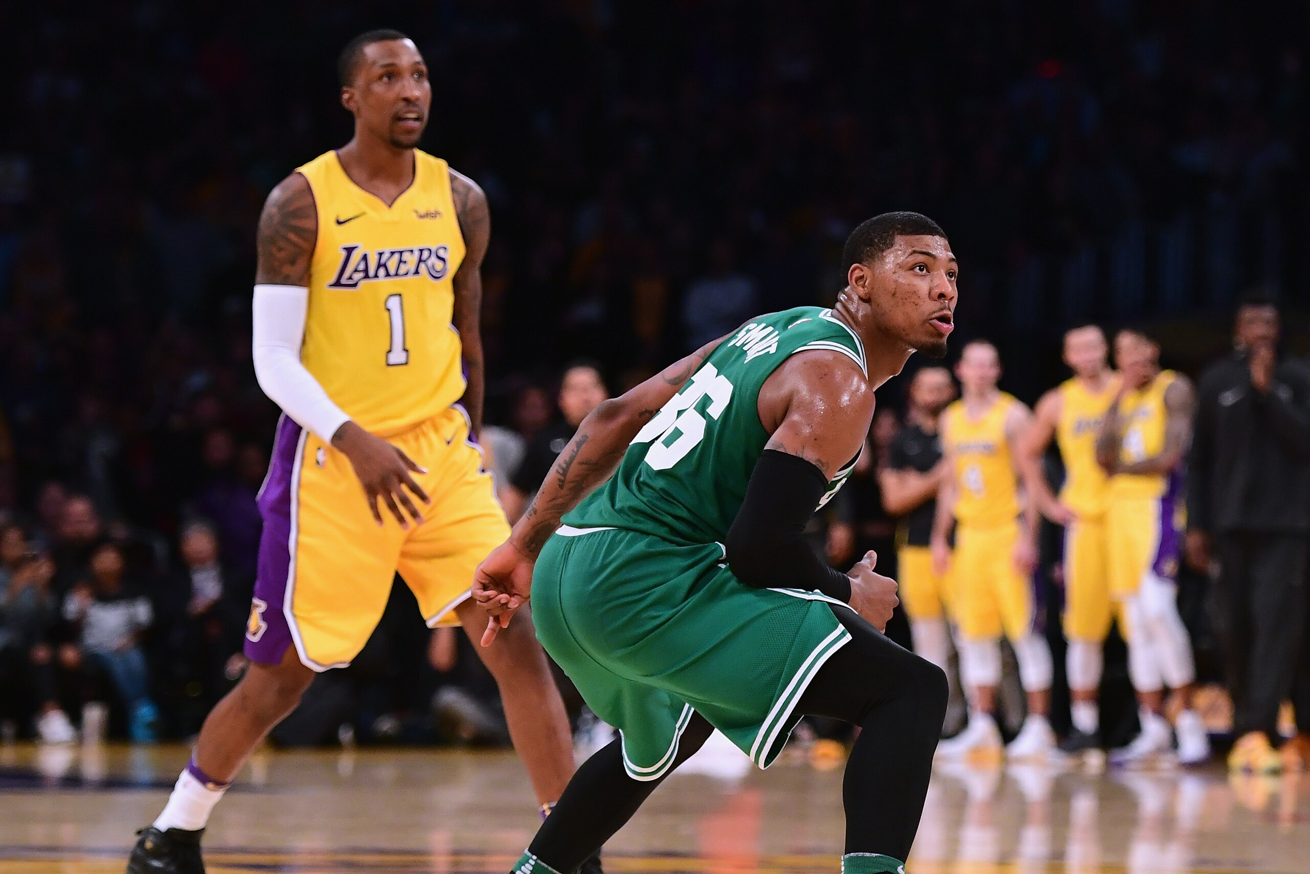 LOS ANGELES, CA - JANUARY 23:  Marcus Smart #36 of the Boston Celtics watches his last shot of the game miss in front of Kentavious Caldwell-Pope #1 of the Los Angeles Lakers to lose 108-107 to the Los Angeles Lakers at Staples Center on January 23, 2018 