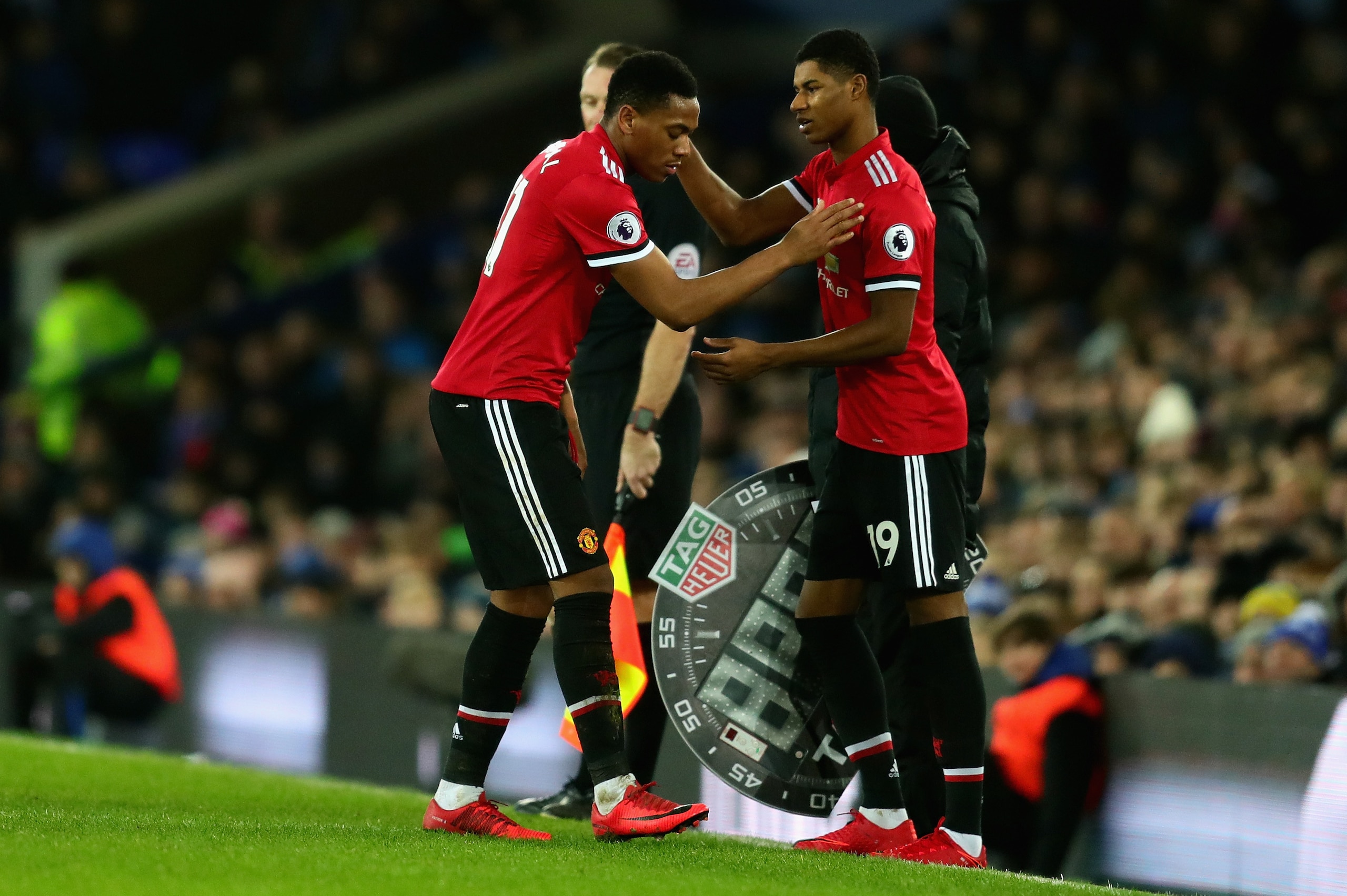 LIVERPOOL, ENGLAND - JANUARY 01: Marcus Rashford of Manchester United replaces Anthony Martial of Manchester United as a substitute during the Premier League match between Everton and Manchester United at Goodison Park on January 1, 2018 in Liverpool, Eng