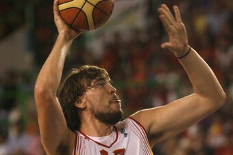 Spain's Marc Gasol fights for the ball during the friendly basket match against  Lithuania at the Paco Paz Sports Palace in Ourense, 18 August 2007.  Spain won the match 97-74. AFP PHOTO / MIGUEL RIOPA (Photo credit should read MIGUEL RIOPA/AFP/Getty Imag