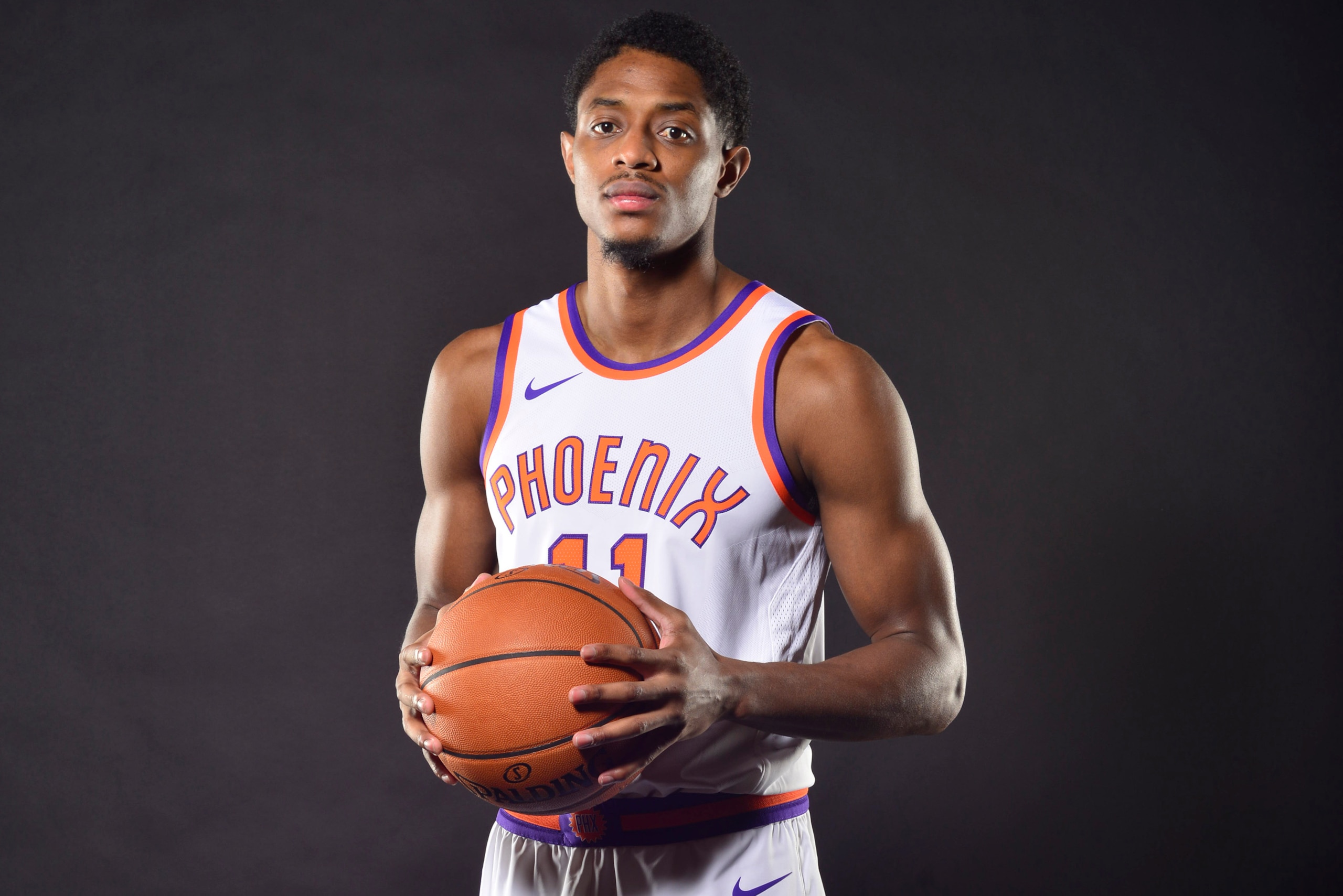PHOENIX, AZ - SEPTEMBER 25: Brandon Knight #11 of the Phoenix Suns poses for a portrait at the Talking Stick Resort Arena in Phoenix, Arizona. NOTE TO USER: User expressly acknowledges and agrees that, by downloading and or using this Photograph, user is PHOENIX, AZ - SEPTEMBER 25: Brandon Knight #11 of the Phoenix Suns poses for a portrait at the Talking Stick Resort Arena in Phoenix, Arizona. NOTE TO USER: User expressly acknowledges and agrees that, by downloading and or using this Photograph, user is