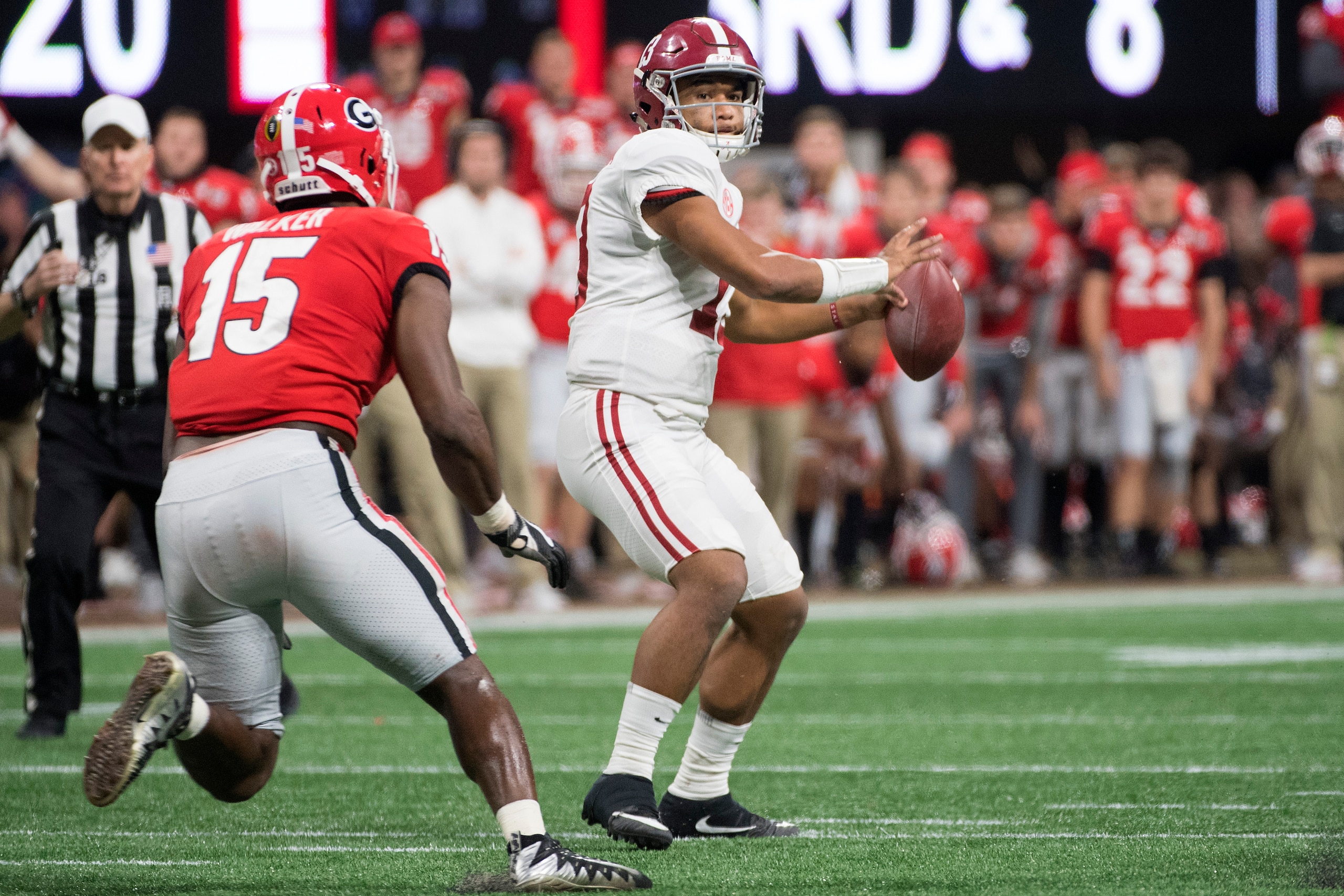 ATLANTA, GA - JANUARY 08: Tua Tagovailoa #13 of the Alabama Crimson Tide passes against the Georgia Bulldogs during the College Football Playoff National Championship held at Mercedes-Benz Stadium on January 8, 2018 in Atlanta, Georgia. Alabama defeated G