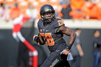 STILLWATER, OK - NOVEMBER 04: Wide receiver James Washington #28 of the Oklahoma State Cowboys warms up before the game against the Oklahoma Sooners at Boone Pickens Stadium on November 4, 2017 in Stillwater, Oklahoma. Oklahoma defeated Oklahoma State 62-