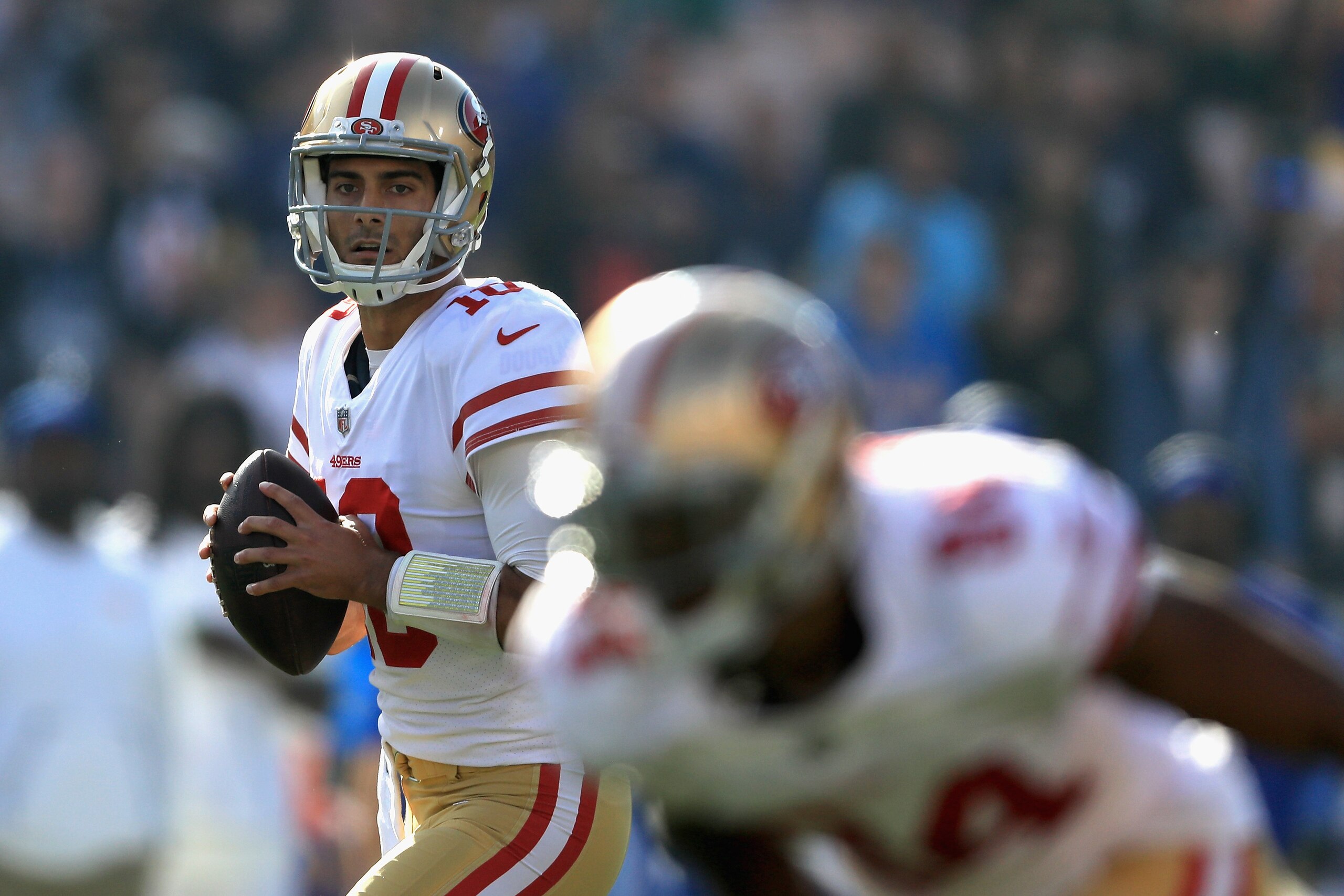 LOS ANGELES, CA - DECEMBER 31:  Jimmy Garoppolo #10 of the San Francisco 49ers looks to pass during the first half of a game against the Los Angeles Rams  at Los Angeles Memorial Coliseum on December 31, 2017 in Los Angeles, California.  (Photo by Sean M.