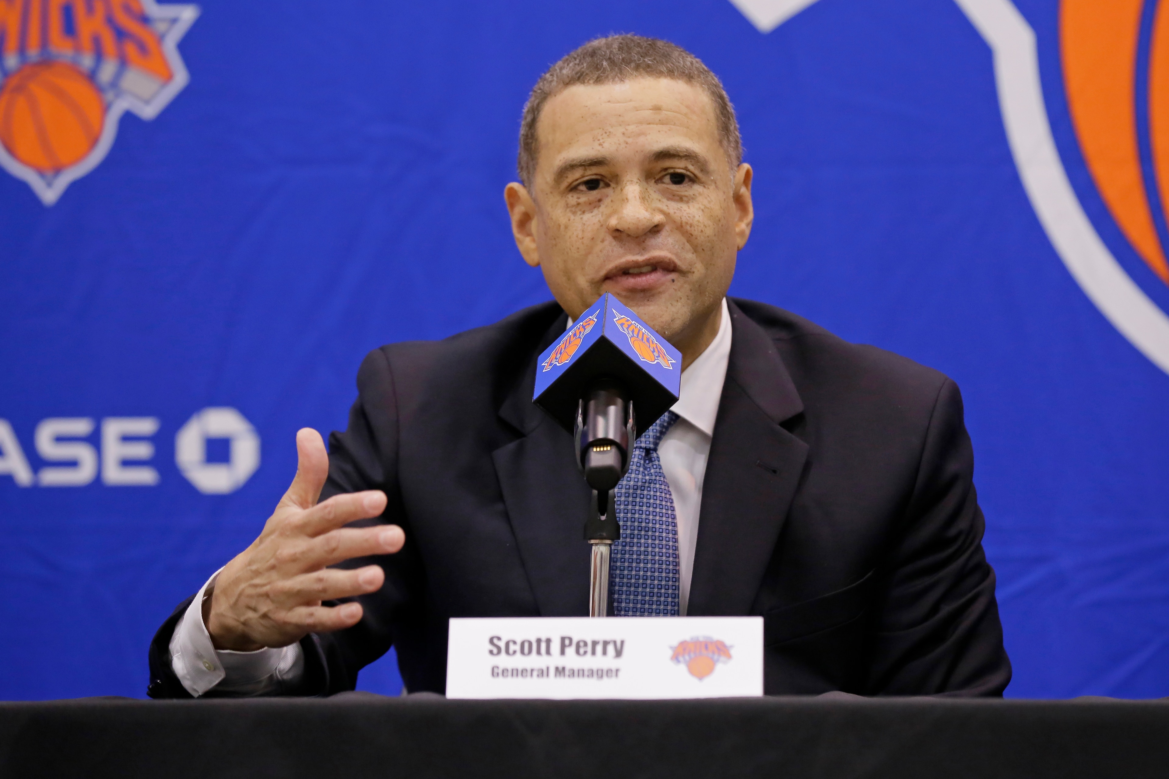 GREENBURG, NY - JULY 17:  New York Knicks team President, Steve Mills and Jeff Hornacek of the New York Knicks introduce General Manager Scott Perry at a pess conference at the at Knicks Practice Center July 17, 2017 in Greenburg, New York. NOTE TO USER: 