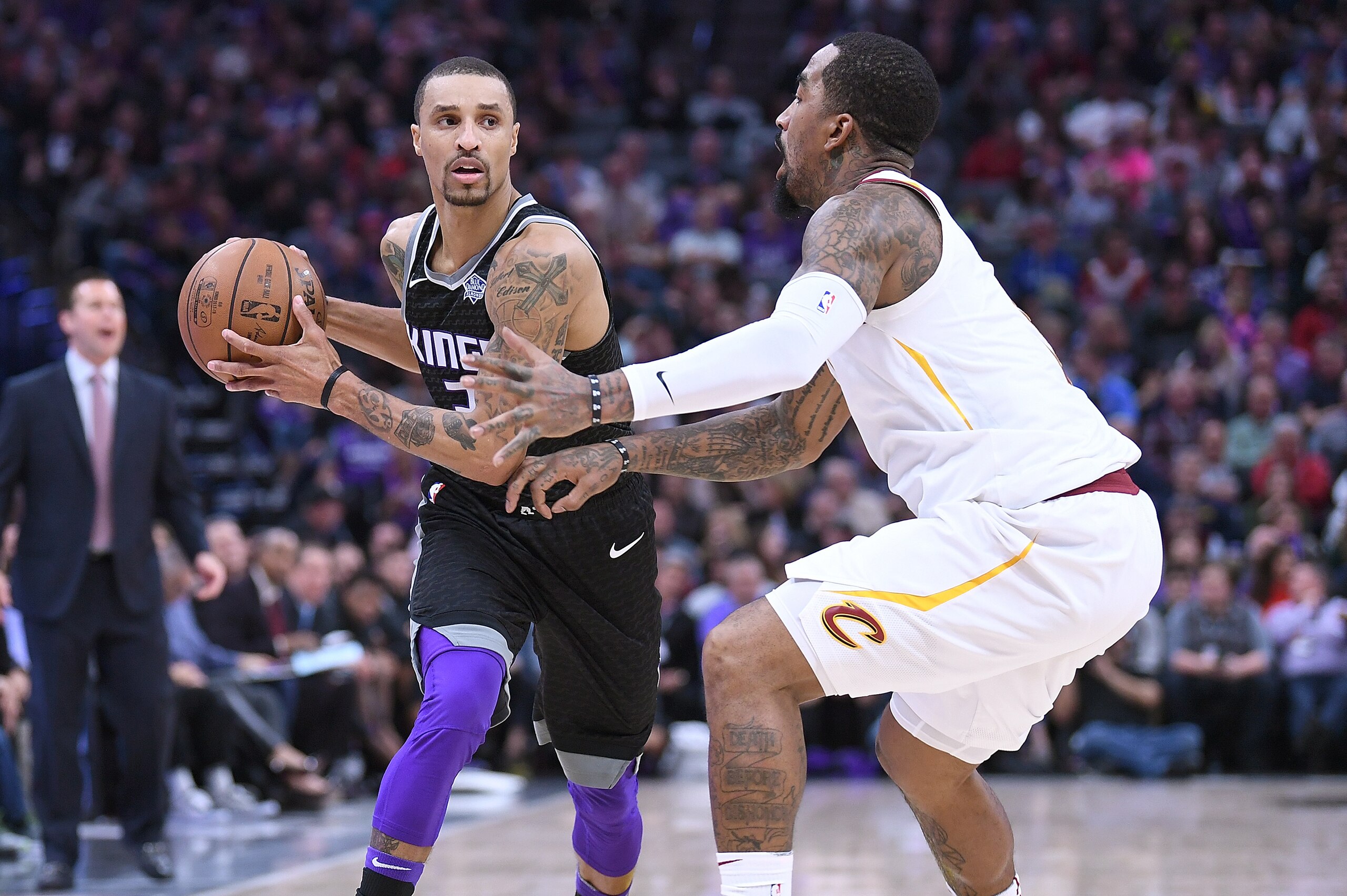 SACRAMENTO, CA - DECEMBER 27:  JR Smith #5 of the Cleveland Cavaliers closely guards George Hill #3 of the Sacramento Kings during their NBA basketball game at Golden 1 Center on December 27, 2017 in Sacramento, California. NOTE TO USER: User expressly ac