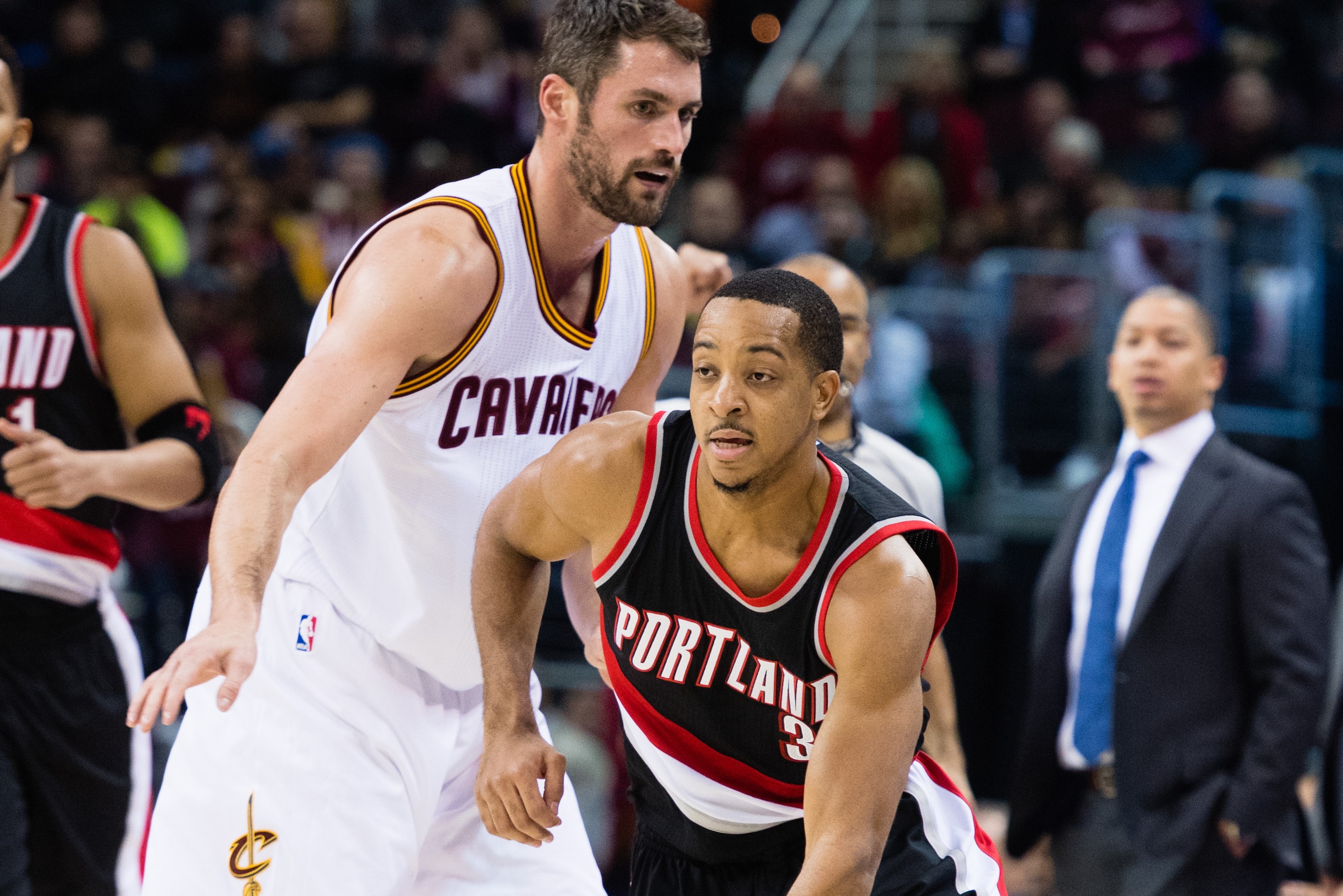 CLEVELAND, OH - NOVEMBER 23: Kevin Love #0 of the Cleveland Cavaliers puts pressure on C.J. McCollum #3 of the Portland Trail Blazers during the first half at Quicken Loans Arena on November 23, 2016 in Cleveland, Ohio. (Photo by Jason Miller/Getty Images