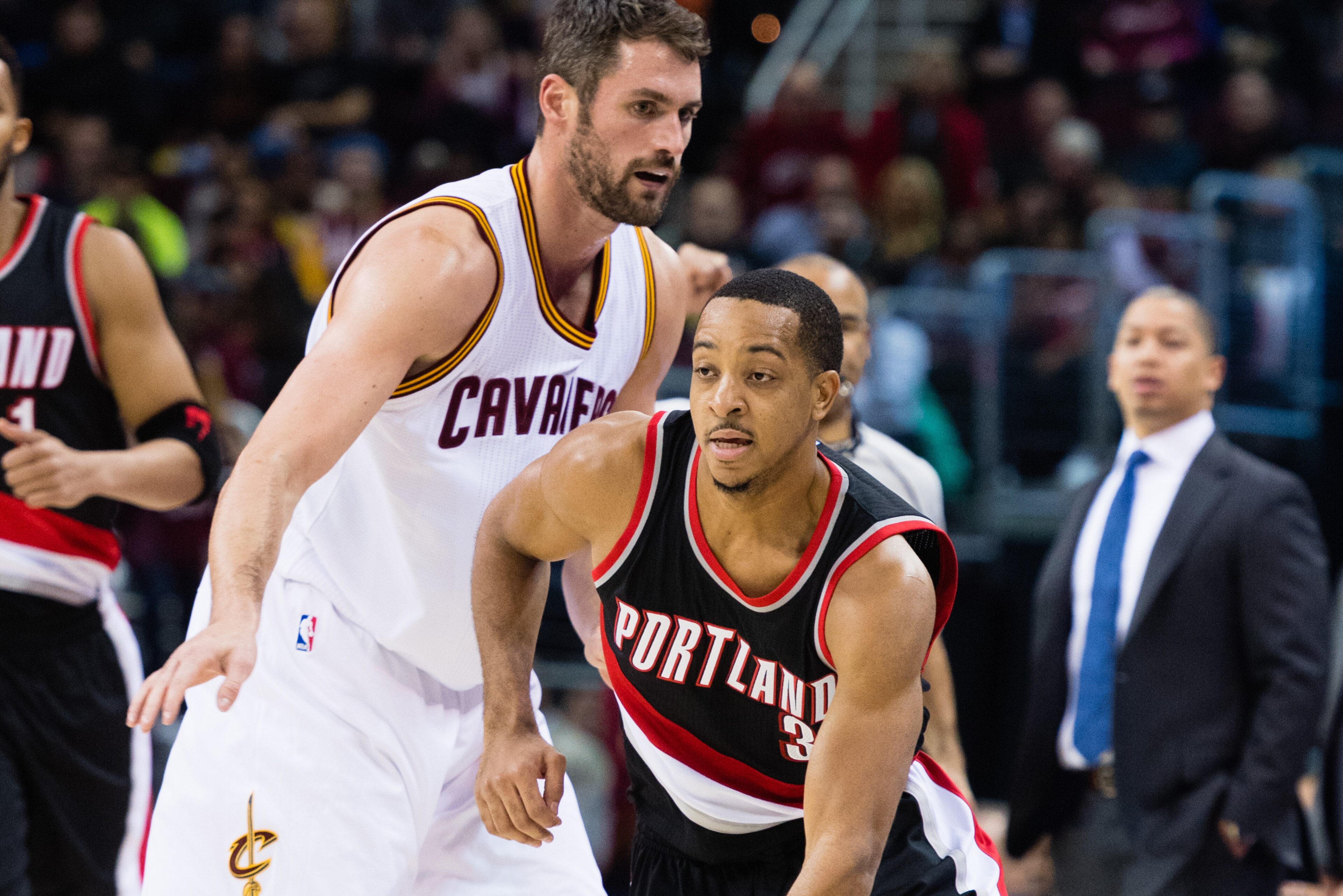 CLEVELAND, OH - NOVEMBER 23: Kevin Love #0 of the Cleveland Cavaliers puts pressure on C.J. McCollum #3 of the Portland Trail Blazers during the first half at Quicken Loans Arena on November 23, 2016 in Cleveland, Ohio. (Photo by Jason Miller/Getty Images